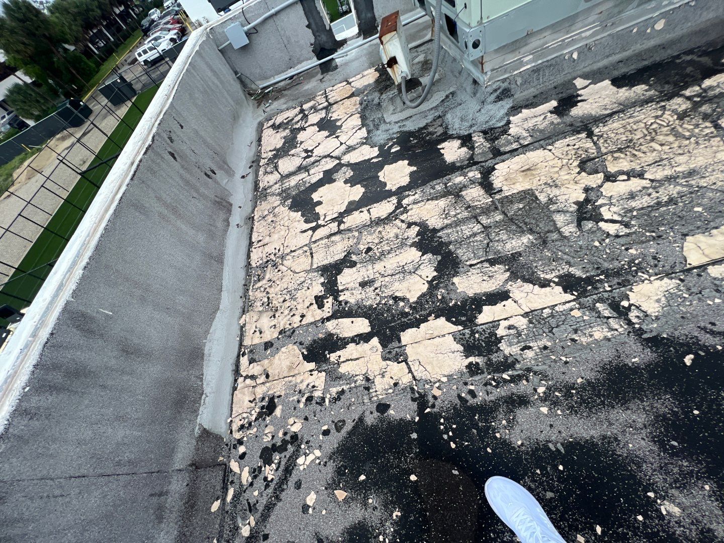 Commercial Roofing Repair using Roof Sealant by Four Peaks Roofing
