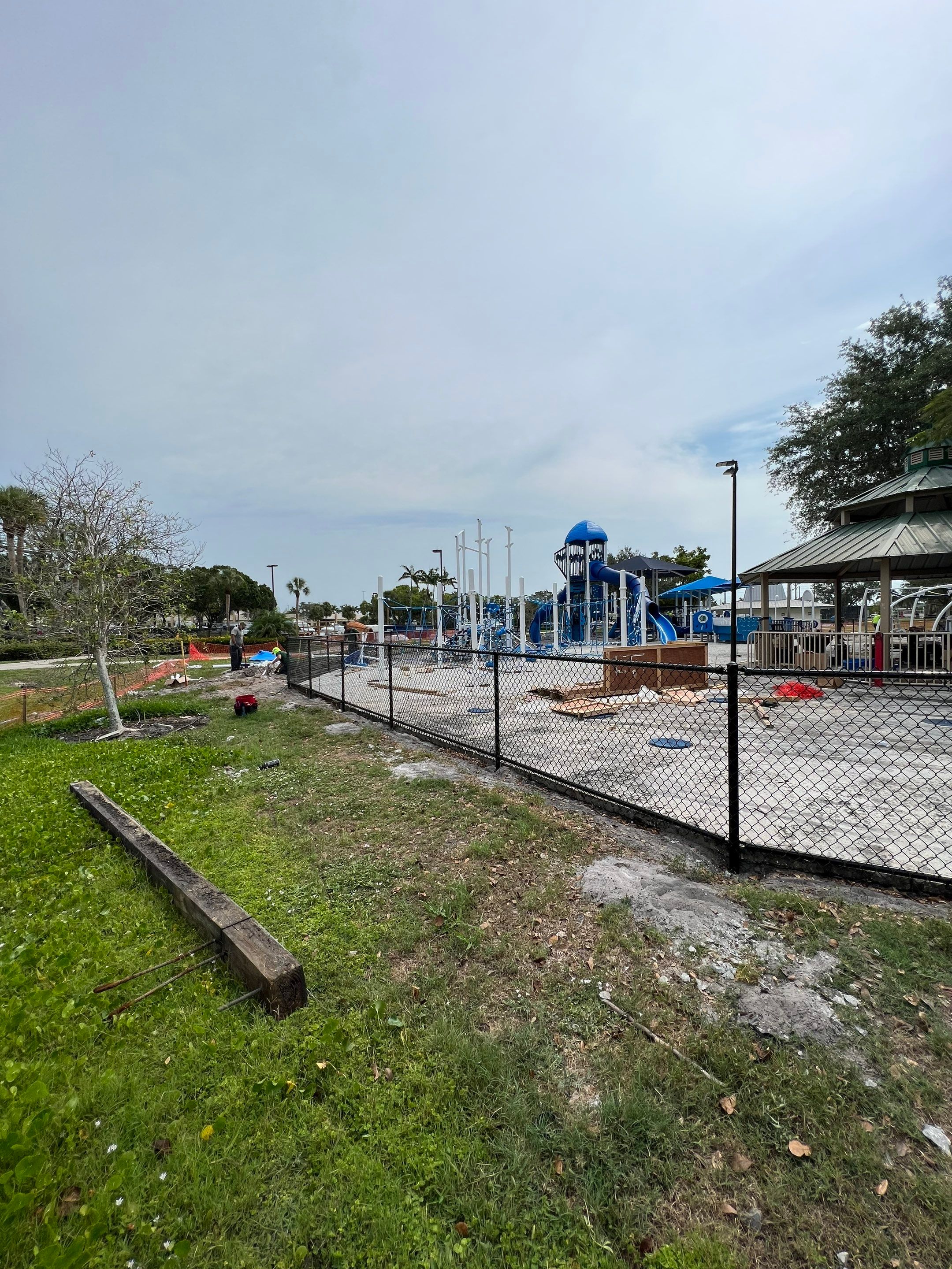 Vinyl Coated Chain-link fence for the City of Naples around Fleischmann Park Playground.  by Asap fence and gates, LLC