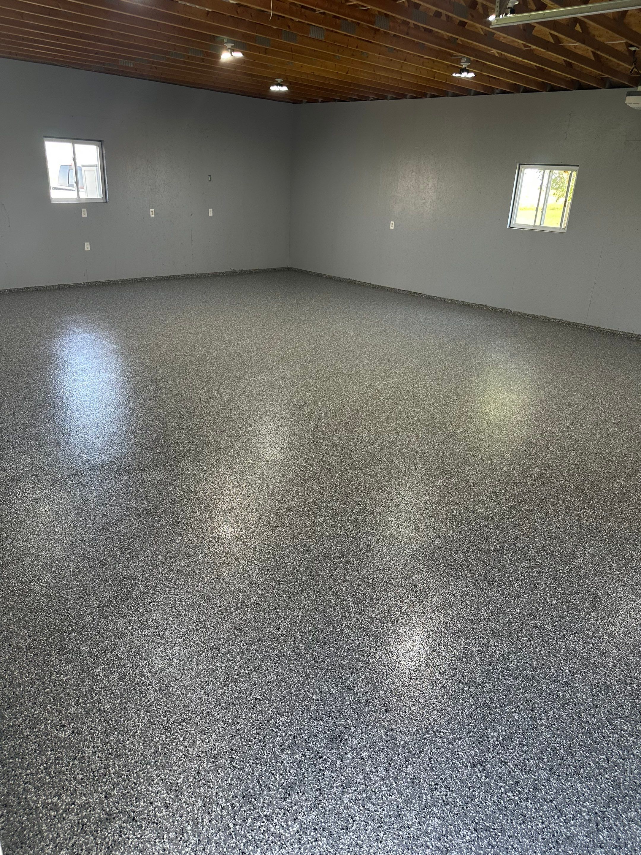 Four-Stall Garage Epoxy Floor Coating in Hampton by Goat Coatings