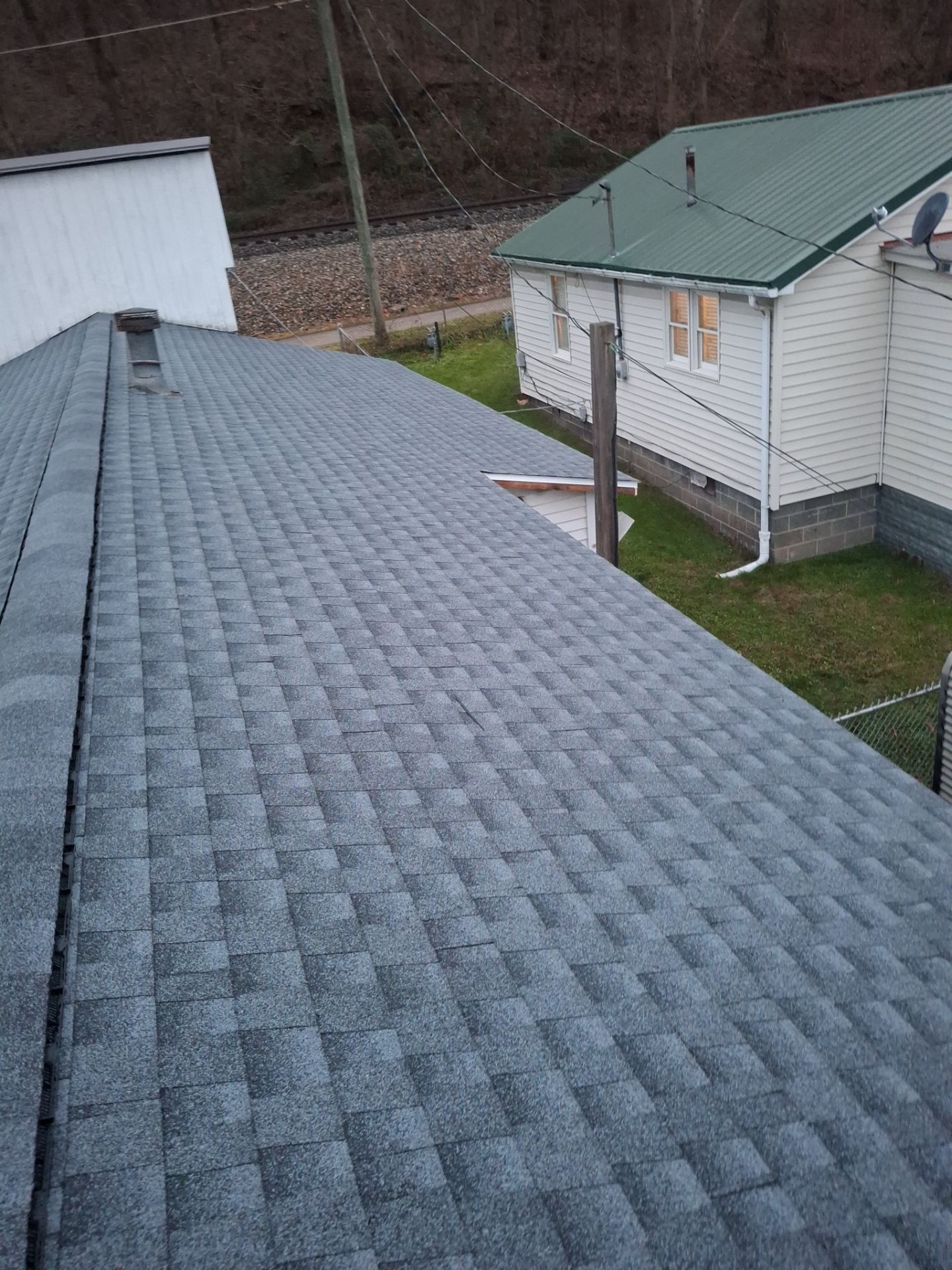 Residential Roofing Installation using GAF Timberline HDZ Oyster Grey by Rainstoppers Roofing