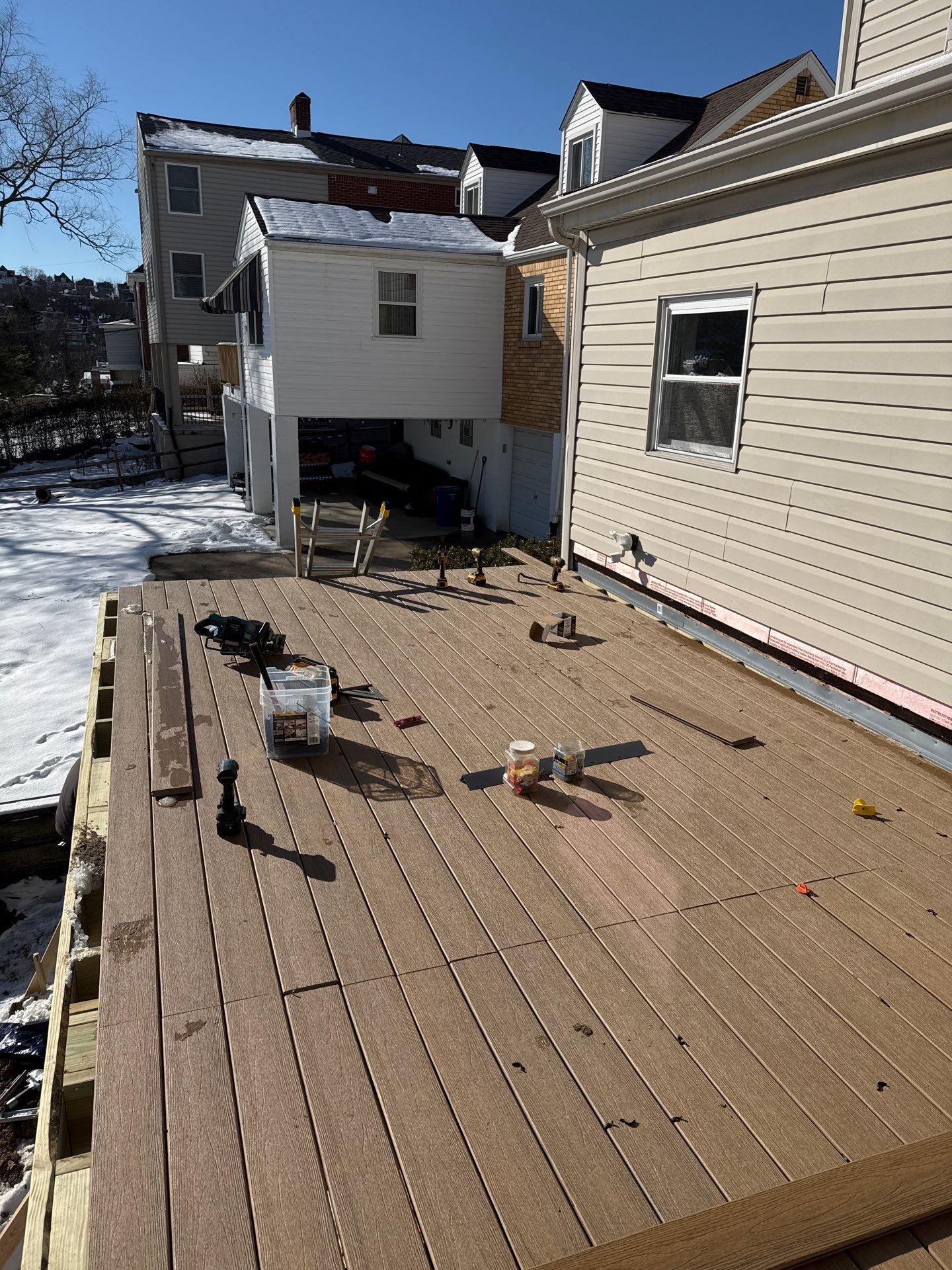 Deck and door by Cousins Roofing Siding & Decks