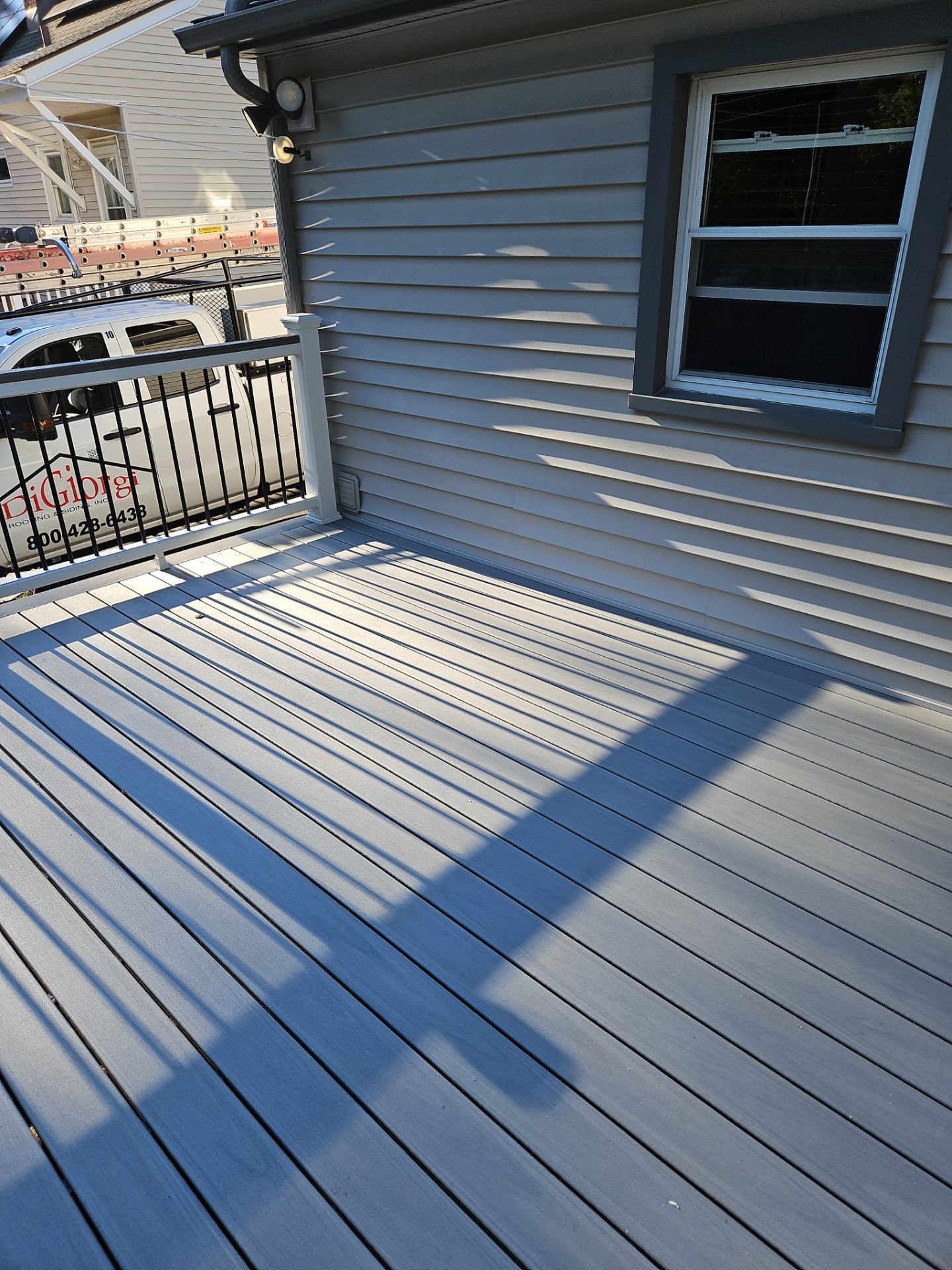 Deck Replacement using Trex Lineage Rainier with matching Cocktail rail and Lattice by DiGiorgi Roofing and Siding Inc