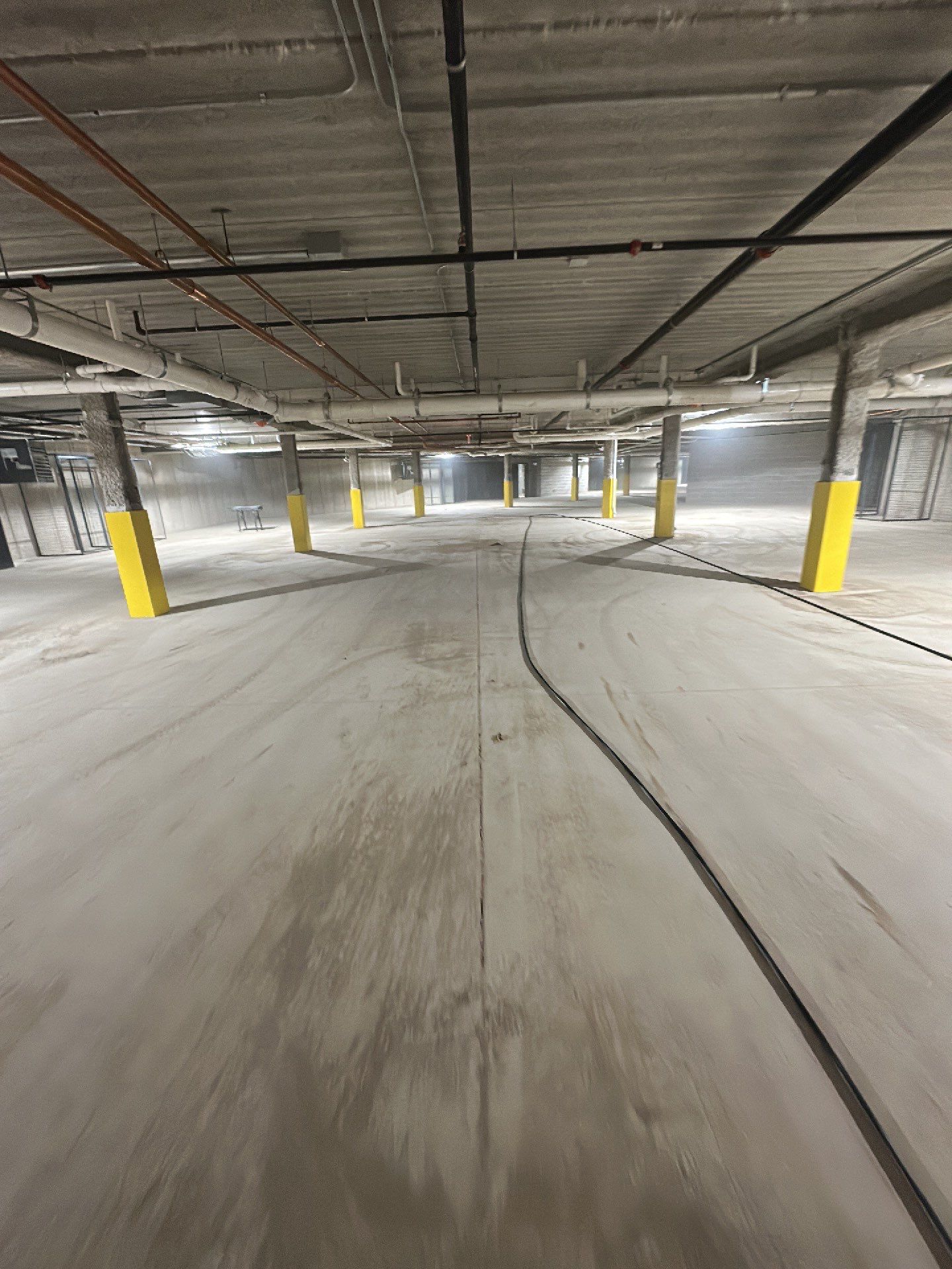 Parking garage post construction cleanup by Northern Power Washing LLC.