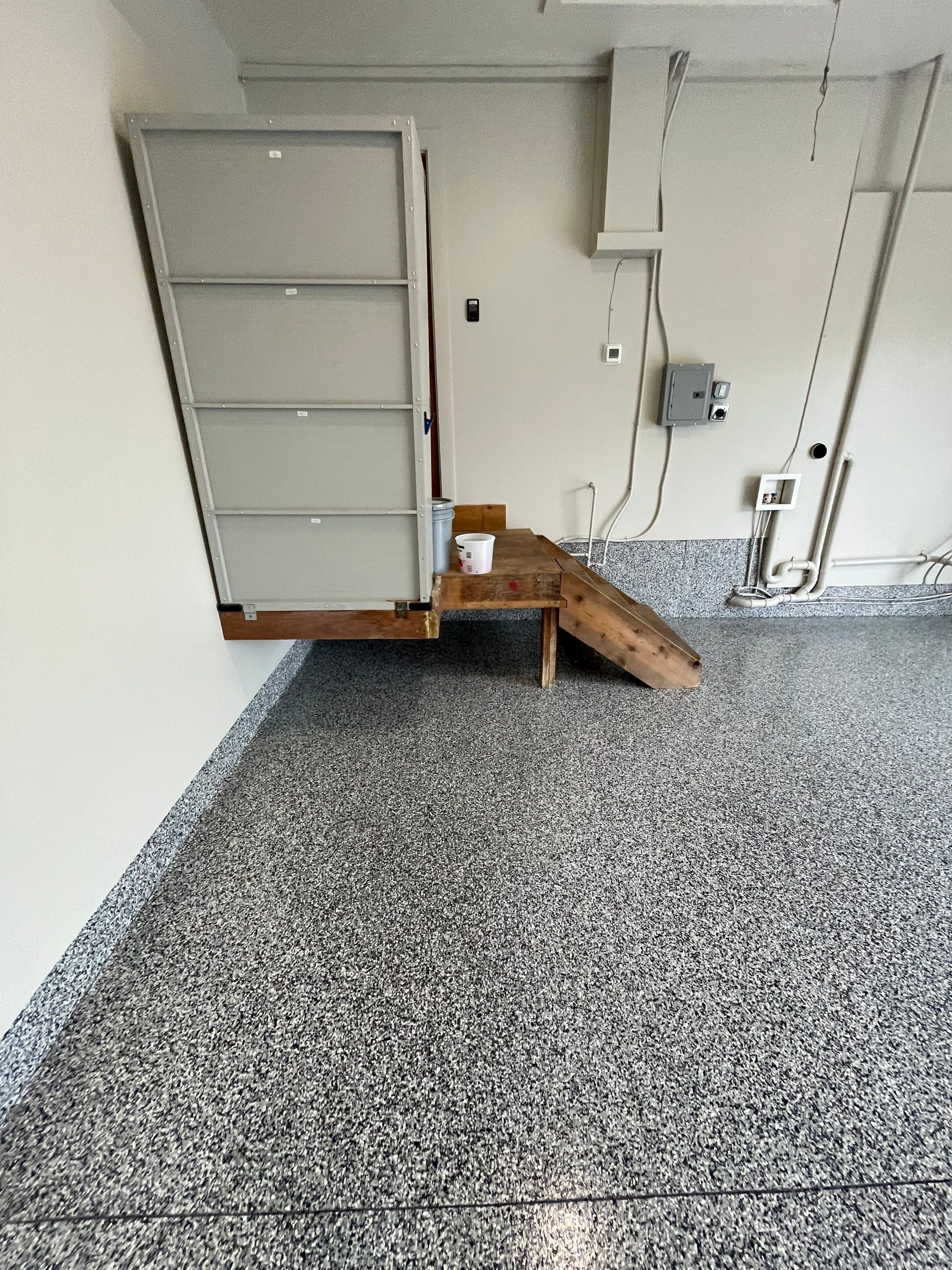 Domino Flake Floor Coating and Crack Repair in Chancellor by Select Painting, Coatings & Garage Cabinets