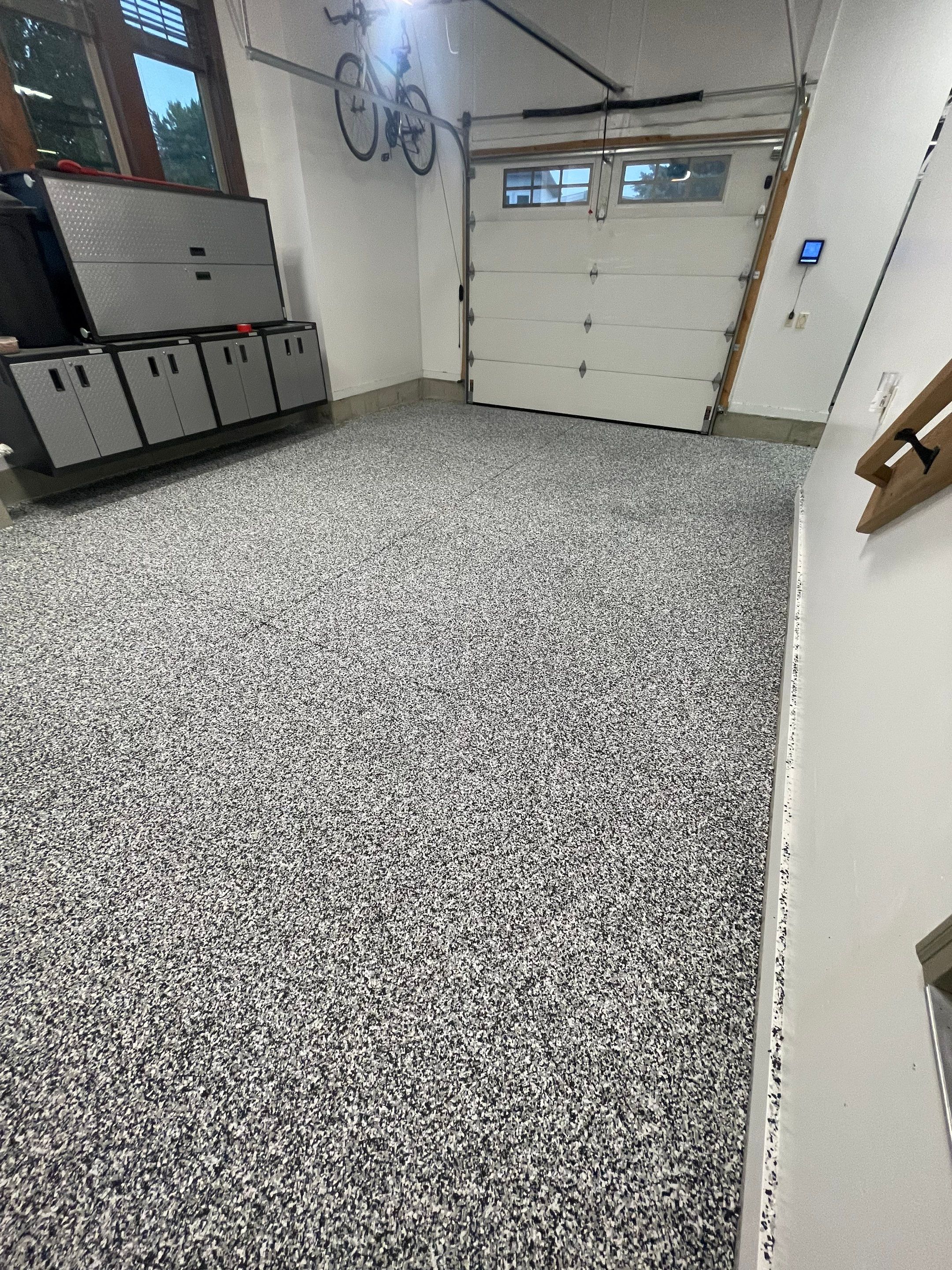 Garage Floor Coating and Domino Flake Finish in Sioux Falls by Select Painting, Coatings & Garage Cabinets