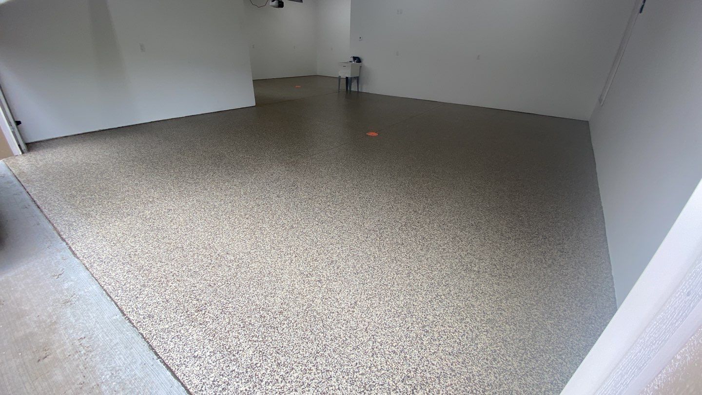 Garage using Cordwood by Select Painting, Coatings & Garage Cabinets