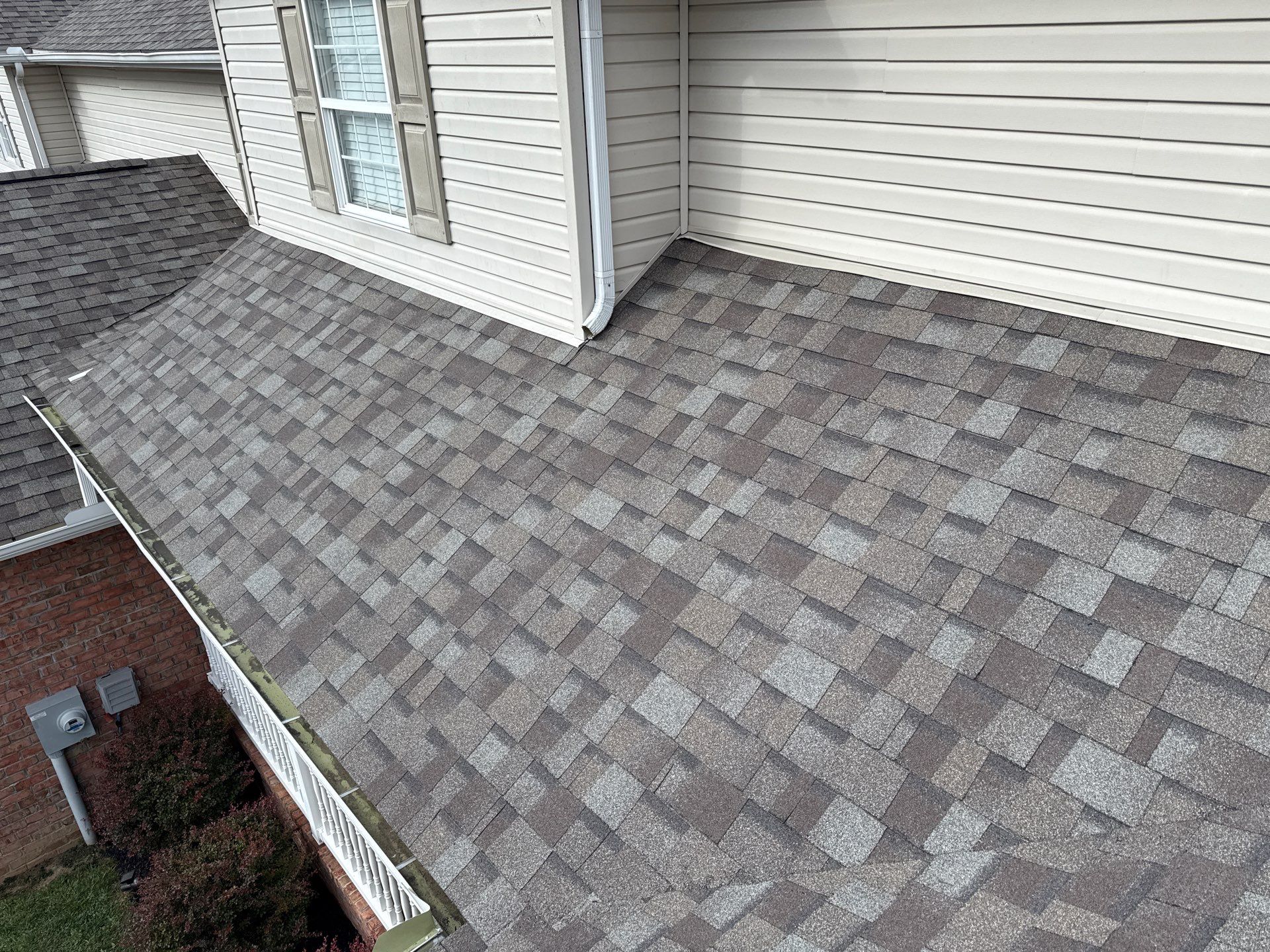 Residential Roofing Installation using Driftwood by Rainstoppers Roofing