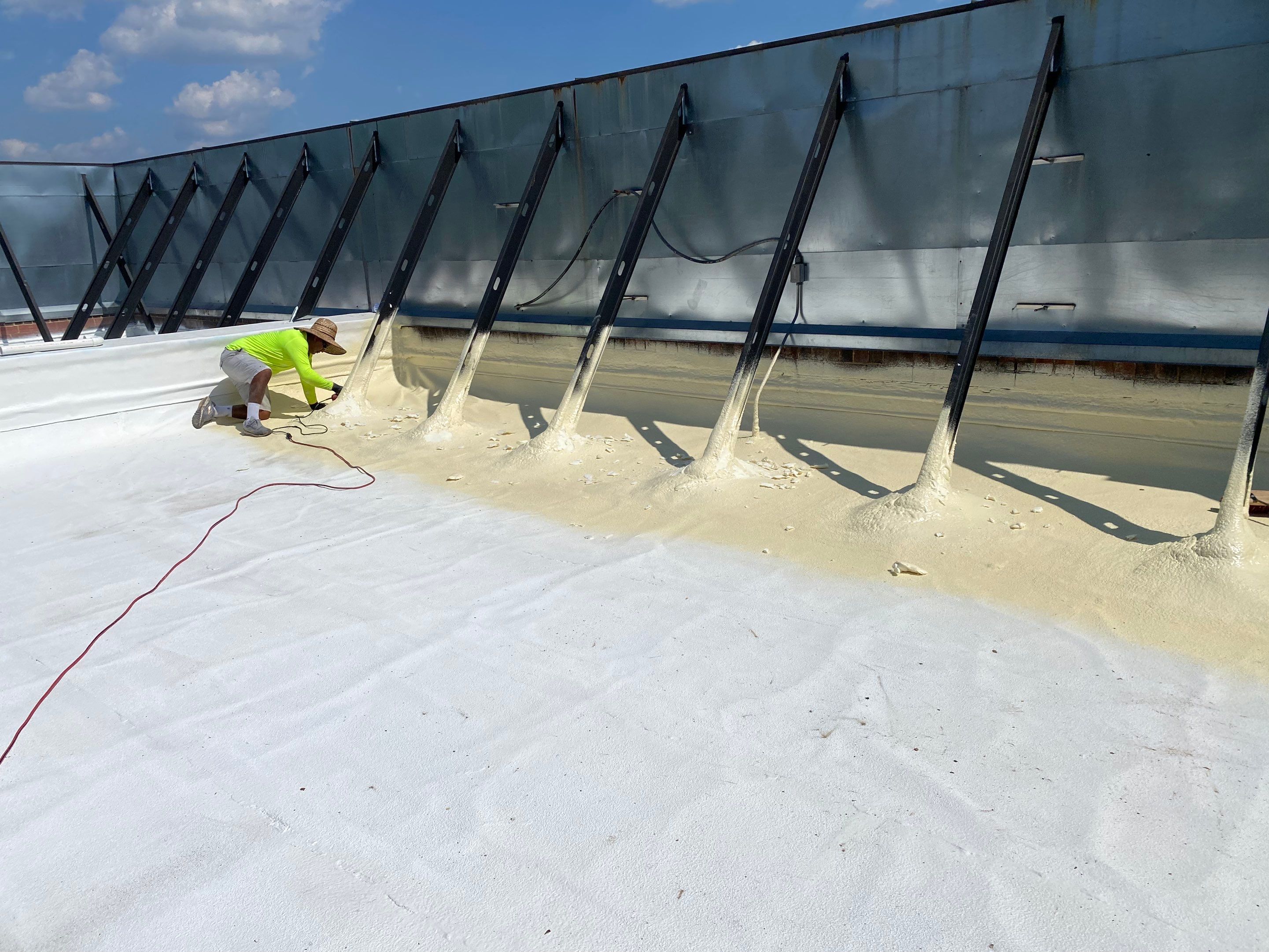 Commercial Roof Coating using Fiberseal basecoat and Silicon Topcoat by Just In Time Roofing and Restoration