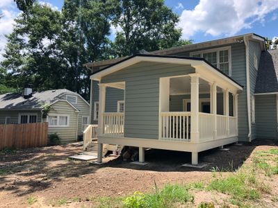 Atlanta Screen Porch Addition Featuring White Brick Outdoor Fireplace