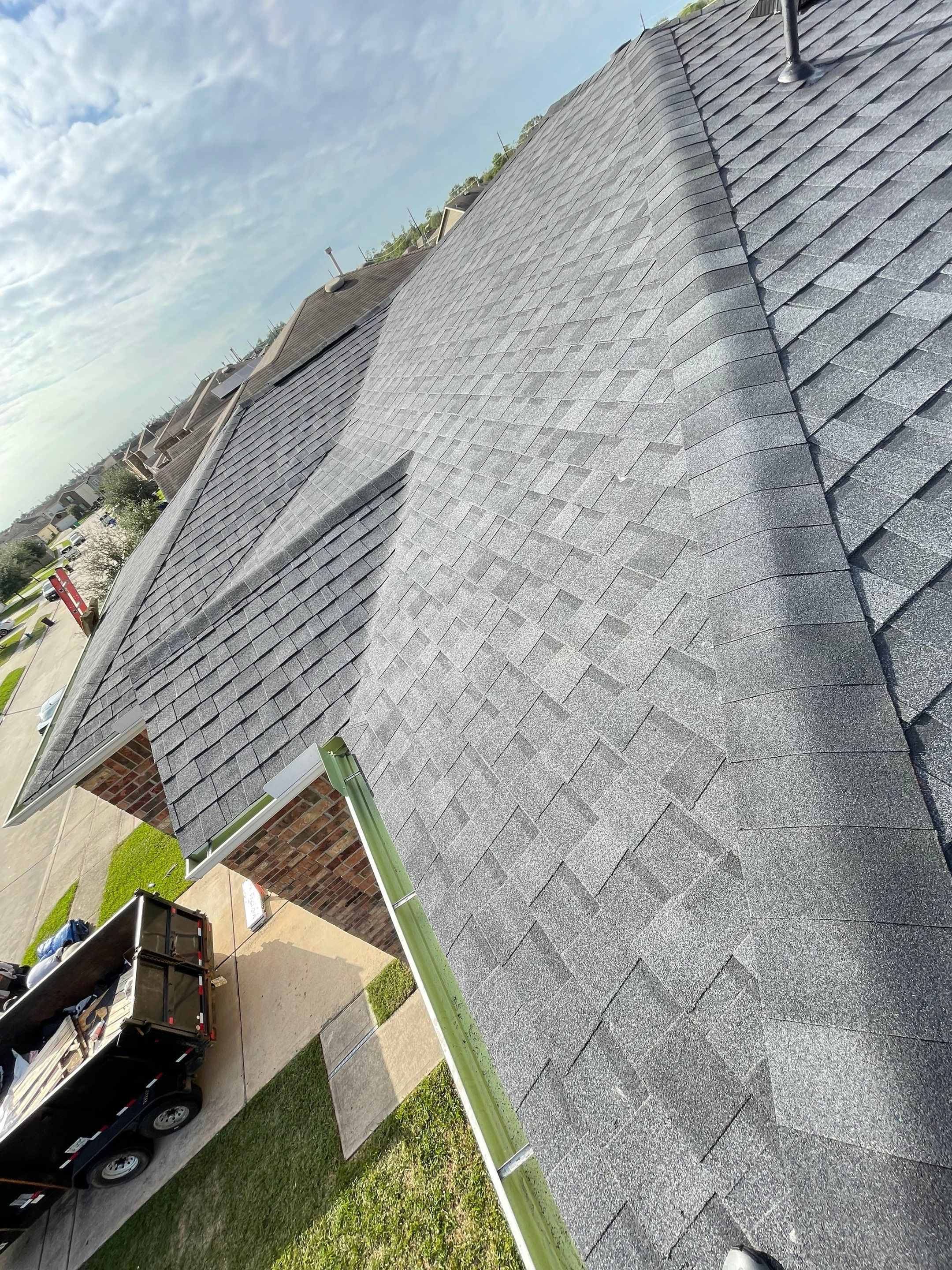 Residential Roofing Installation using Atlas ProLam® Shingles Black Shadow Color by CAP Roofing and Construction LLC