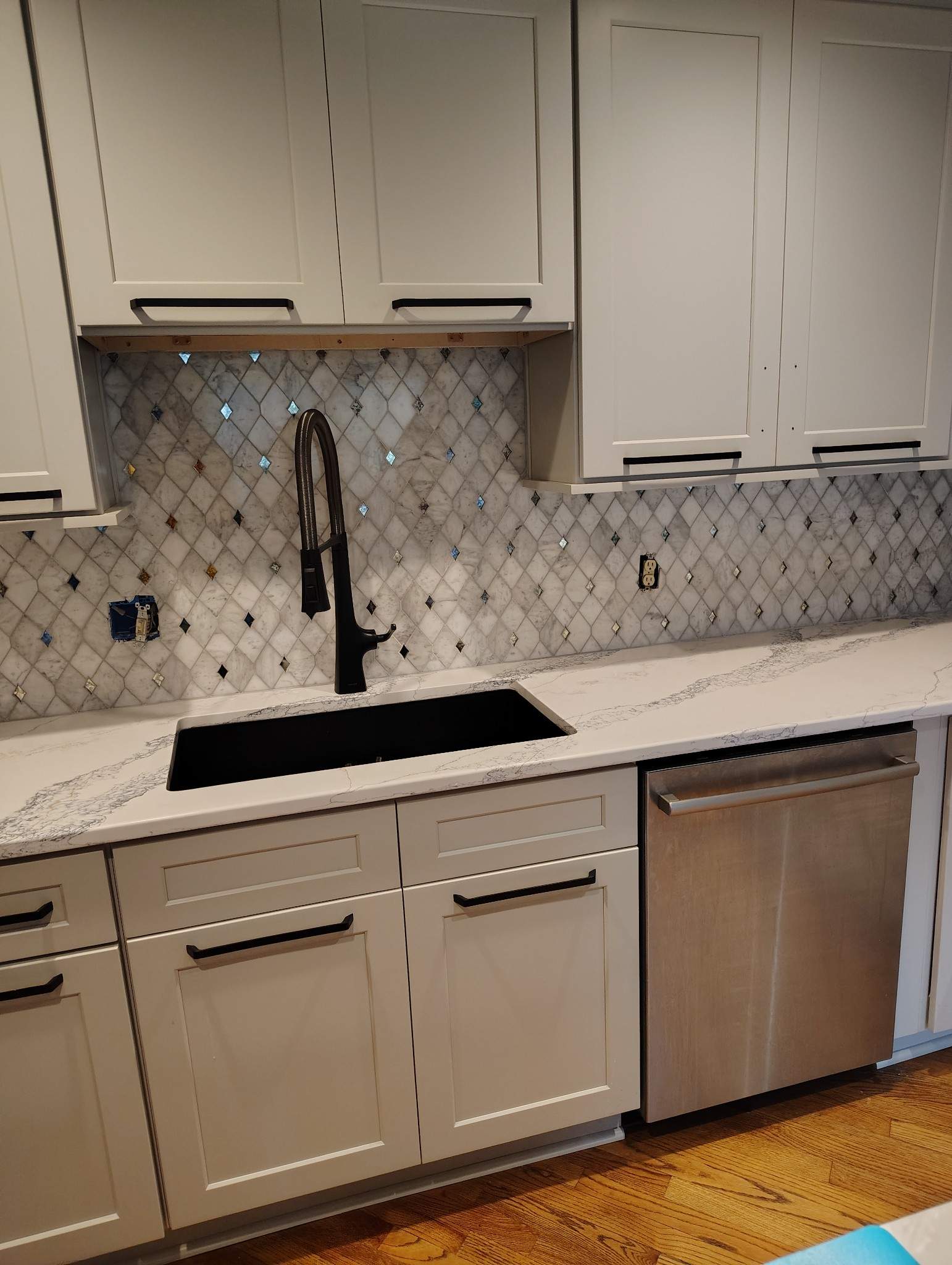 Glamorous Kitchen Backsplash  by Footprints Floors of Nashville