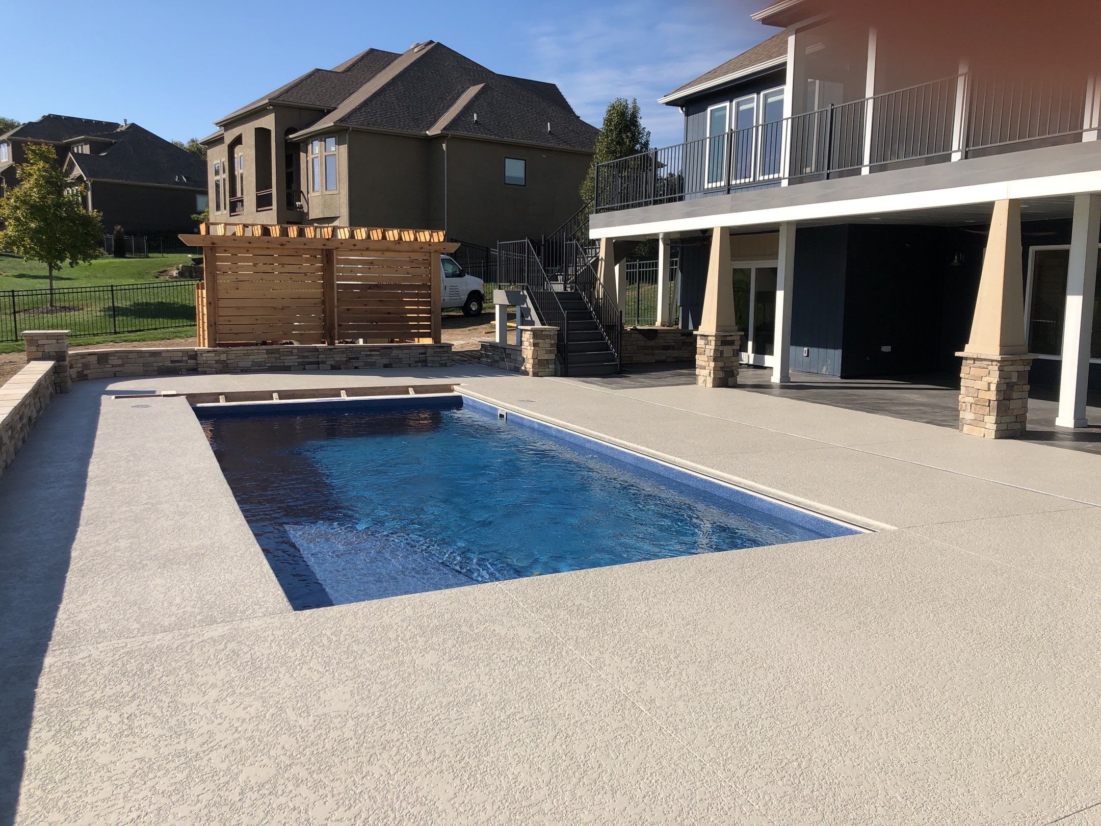 Parkville, MO -- Pool Deck Coating with Classic Texture (knockdown) finish by Big Red Decorative Concrete, LLC