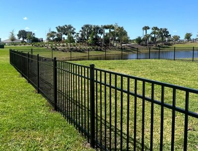 Aluminum Fence Installation using Black 3 Rail Aluminum Fence