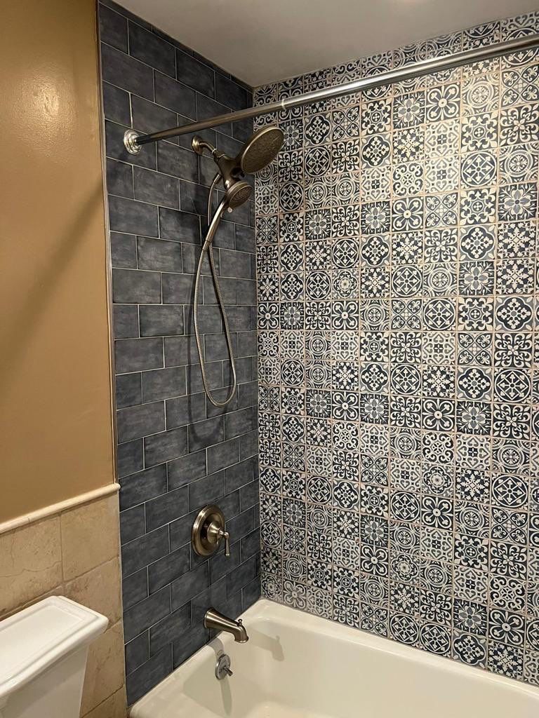 Bathroom Remodel using Tile by Home Concepts Construction