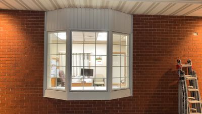 Pella Window installation using Pella Lifestyle wood/Aluminum window