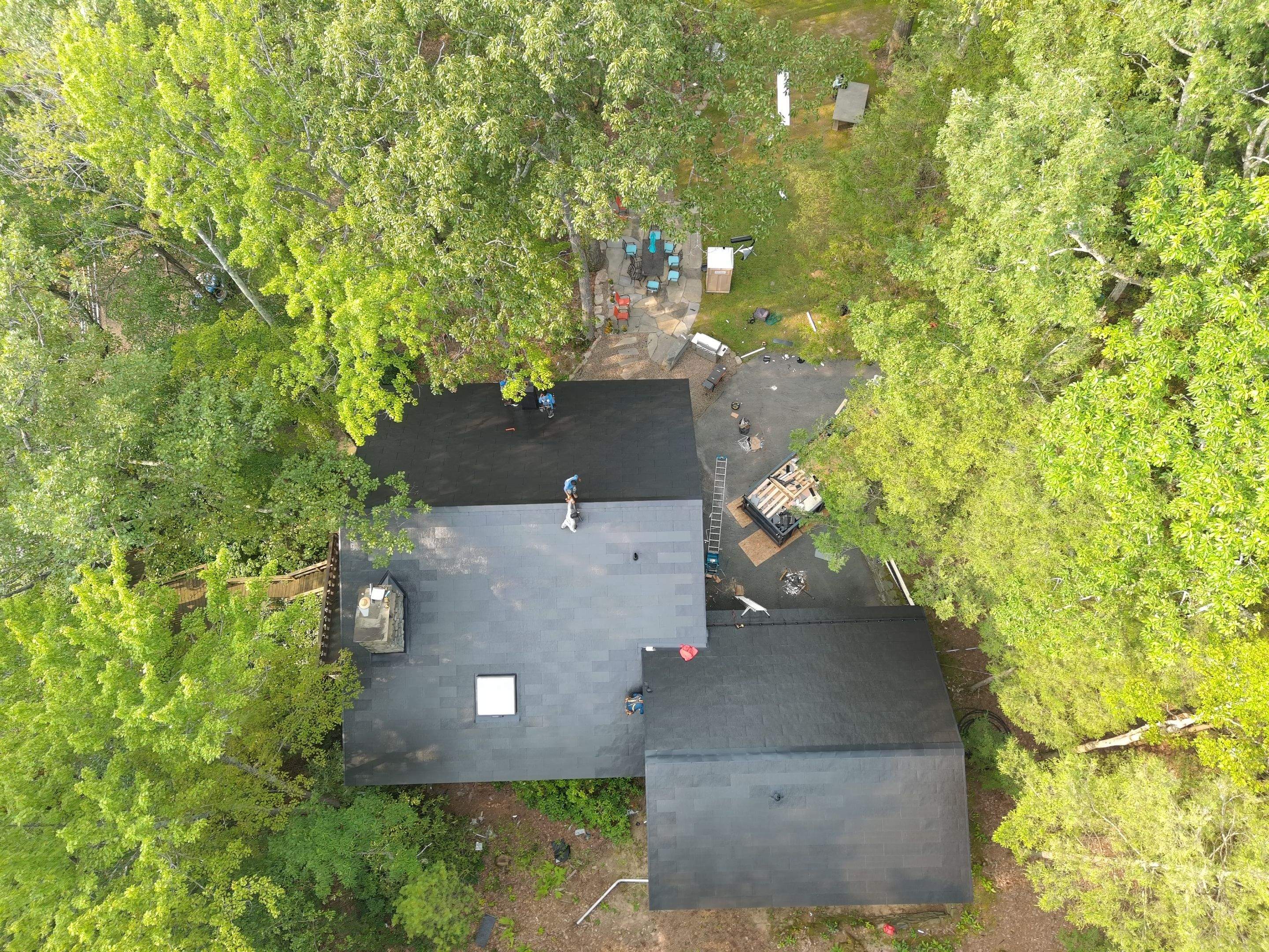 Stunning Tesla Solar Roof Cabin in the Woods by American Home Contractors