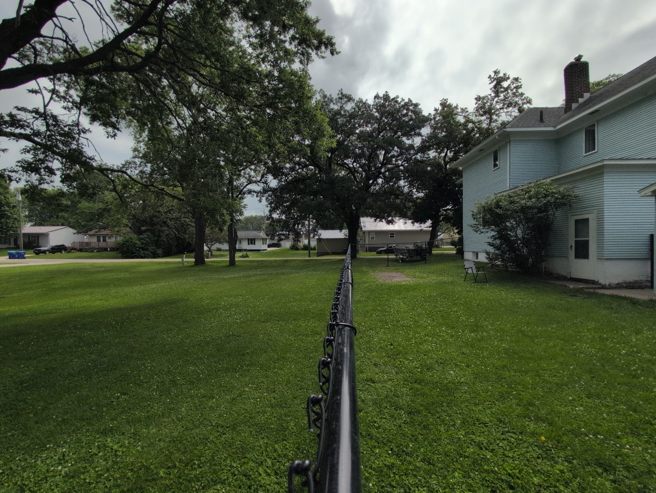Black Vinyl Coated Chain Link Fence Installation in Independence by Perfect Picket Fence and Stain