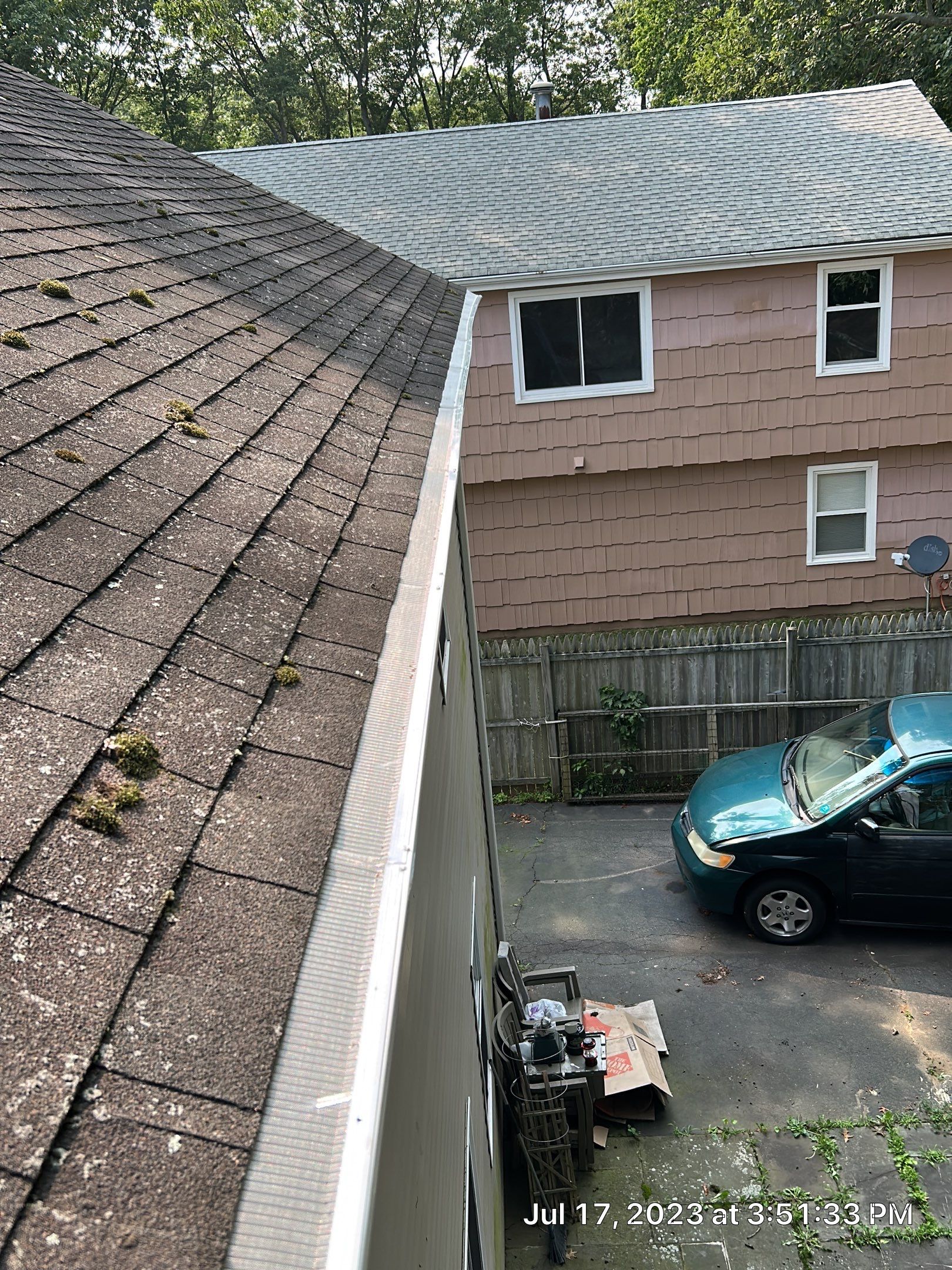 Gutter Installation using 5k White gutters by A Plus Exterior