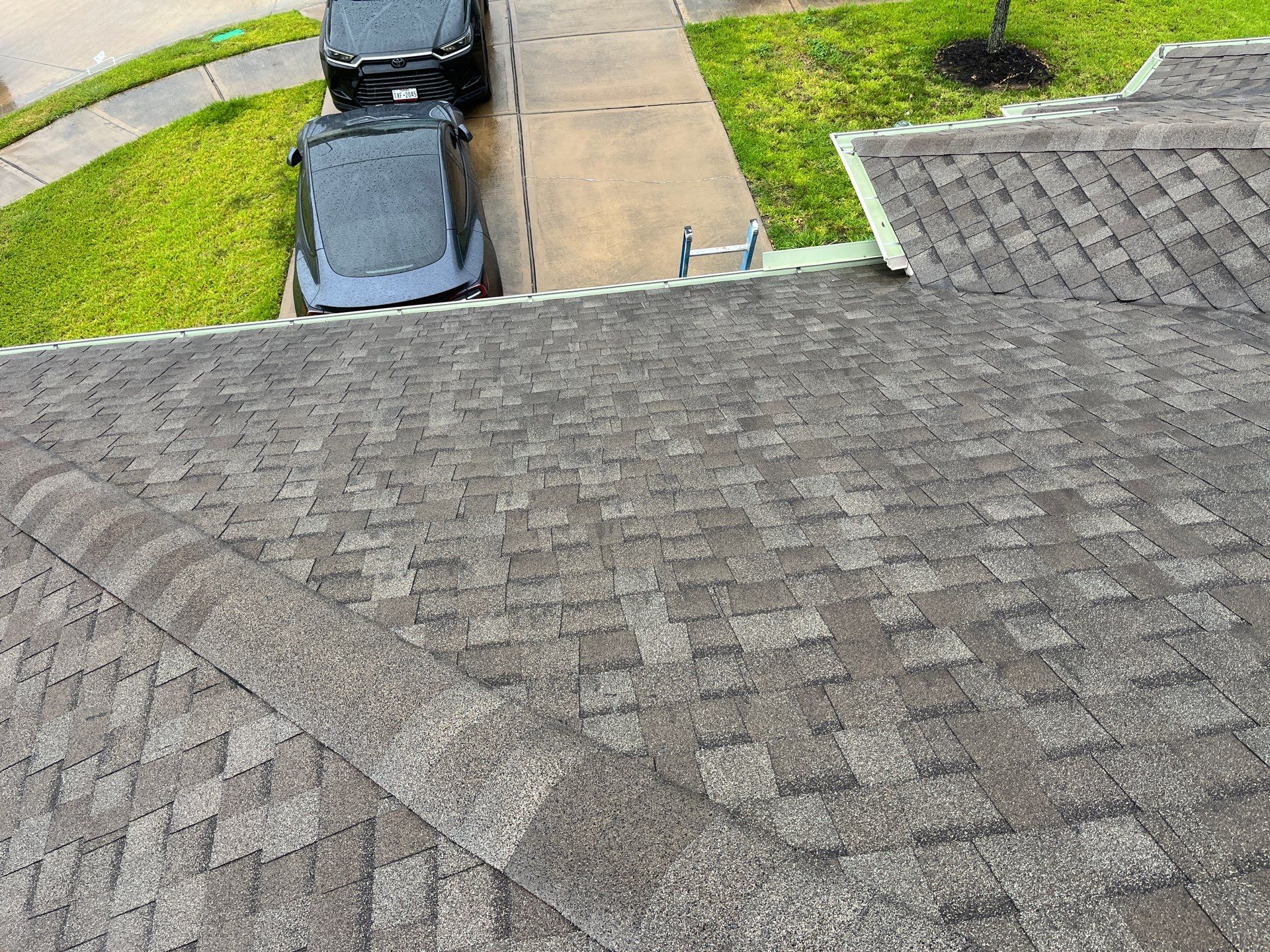 Hail Damage using Owen's Corning Duration (Lifetime) Shingles by Roof Repair Company
