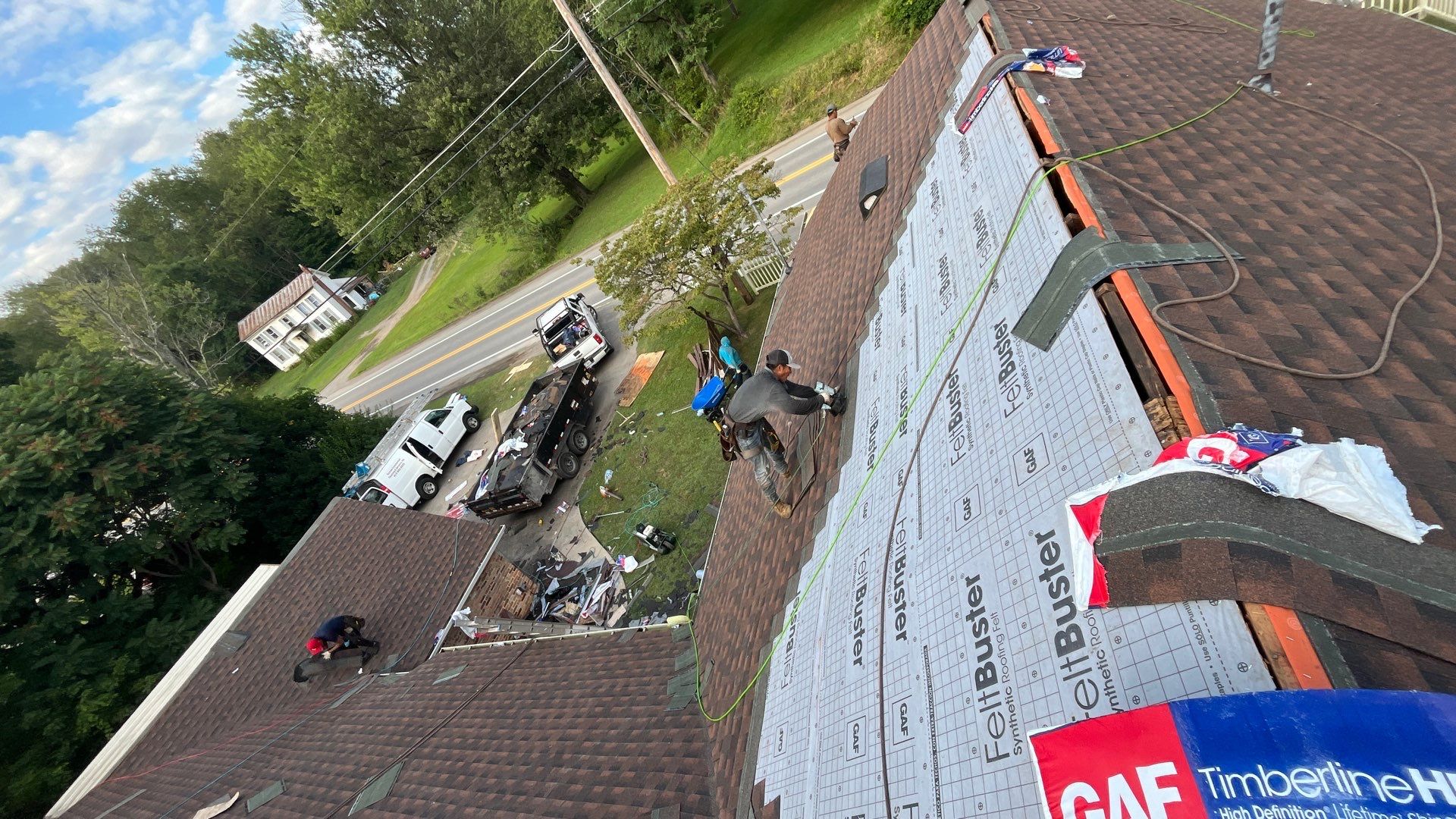 Residential Roofing Installation using GAF TImberline HDZ Hickory by Rainstoppers Roofing