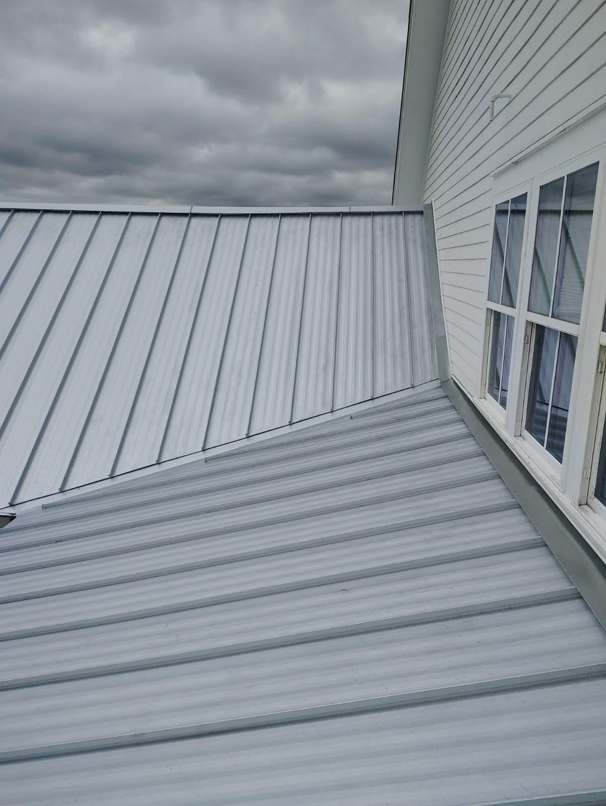 Arctic White Standing Seam by Reimagine Roofing