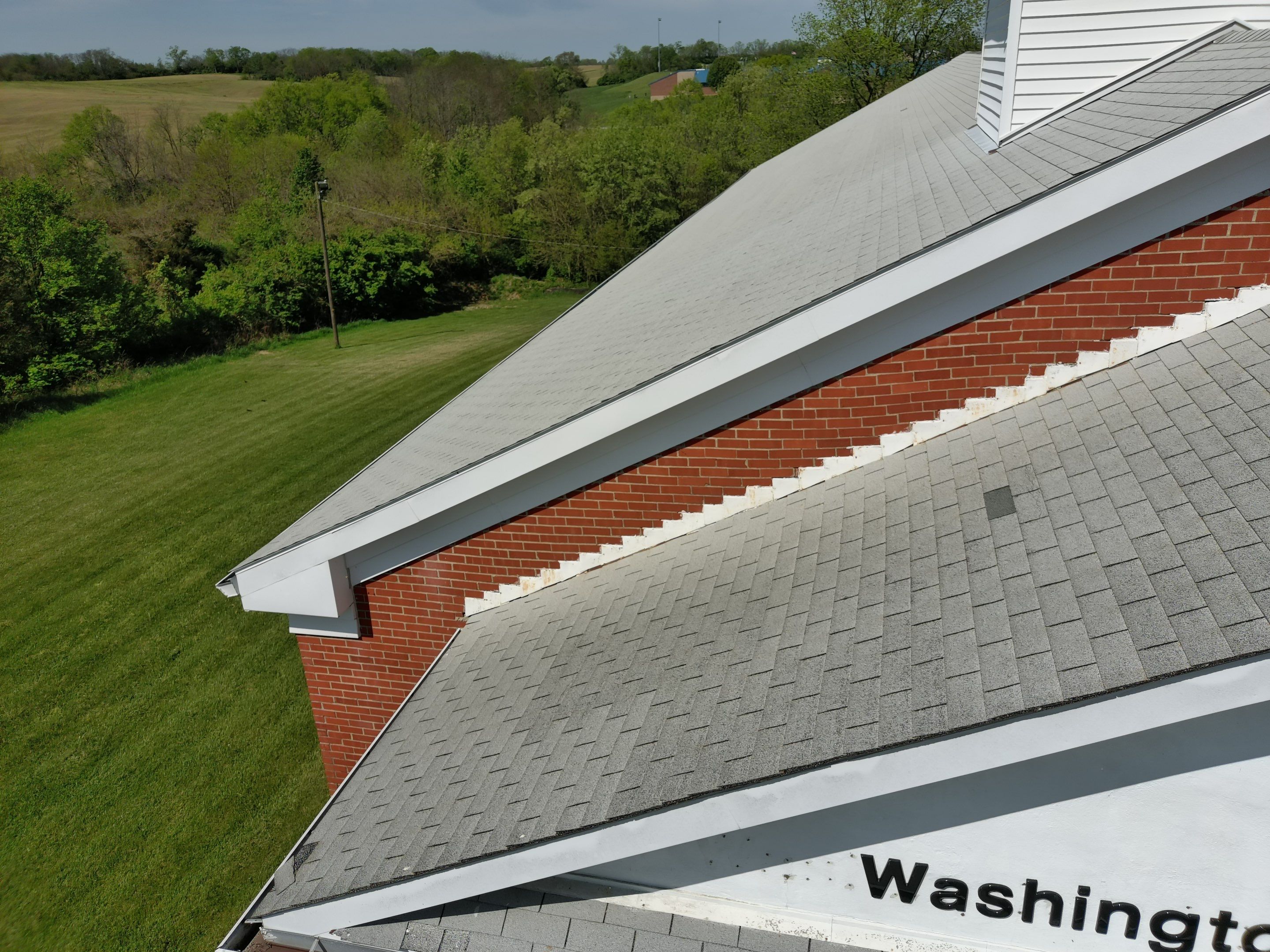 Commercial Roofing Installation using Performance Shingles by Mr. Roofer