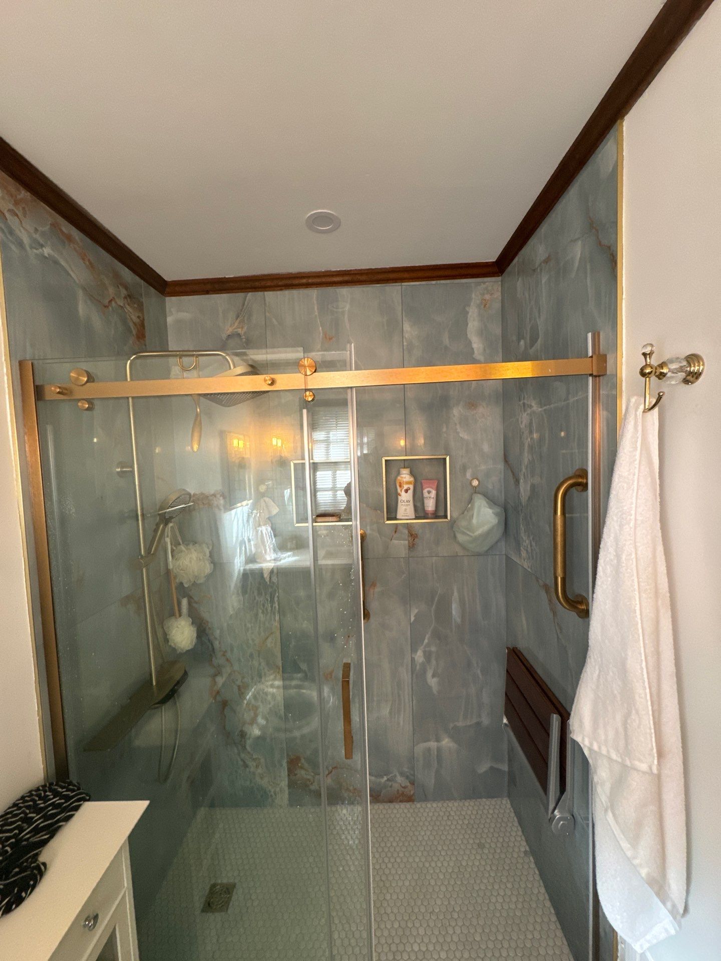 Modern Riverdale Bathroom Renovation Featuring Walk-In Marble Tile Shower by Swift Home Renovations