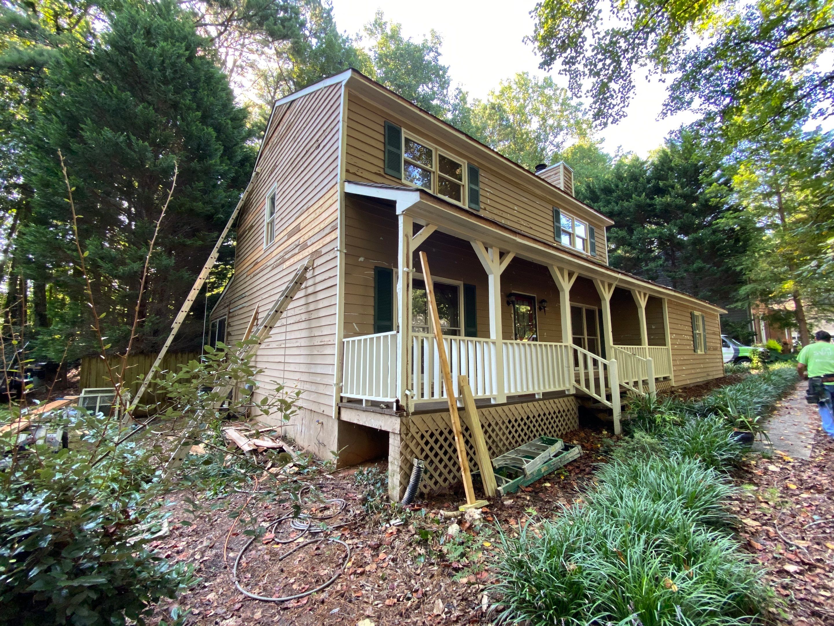 Mableton Exterior Painting and Pressure Treated Wood Deck Installation by Swift Home Renovations