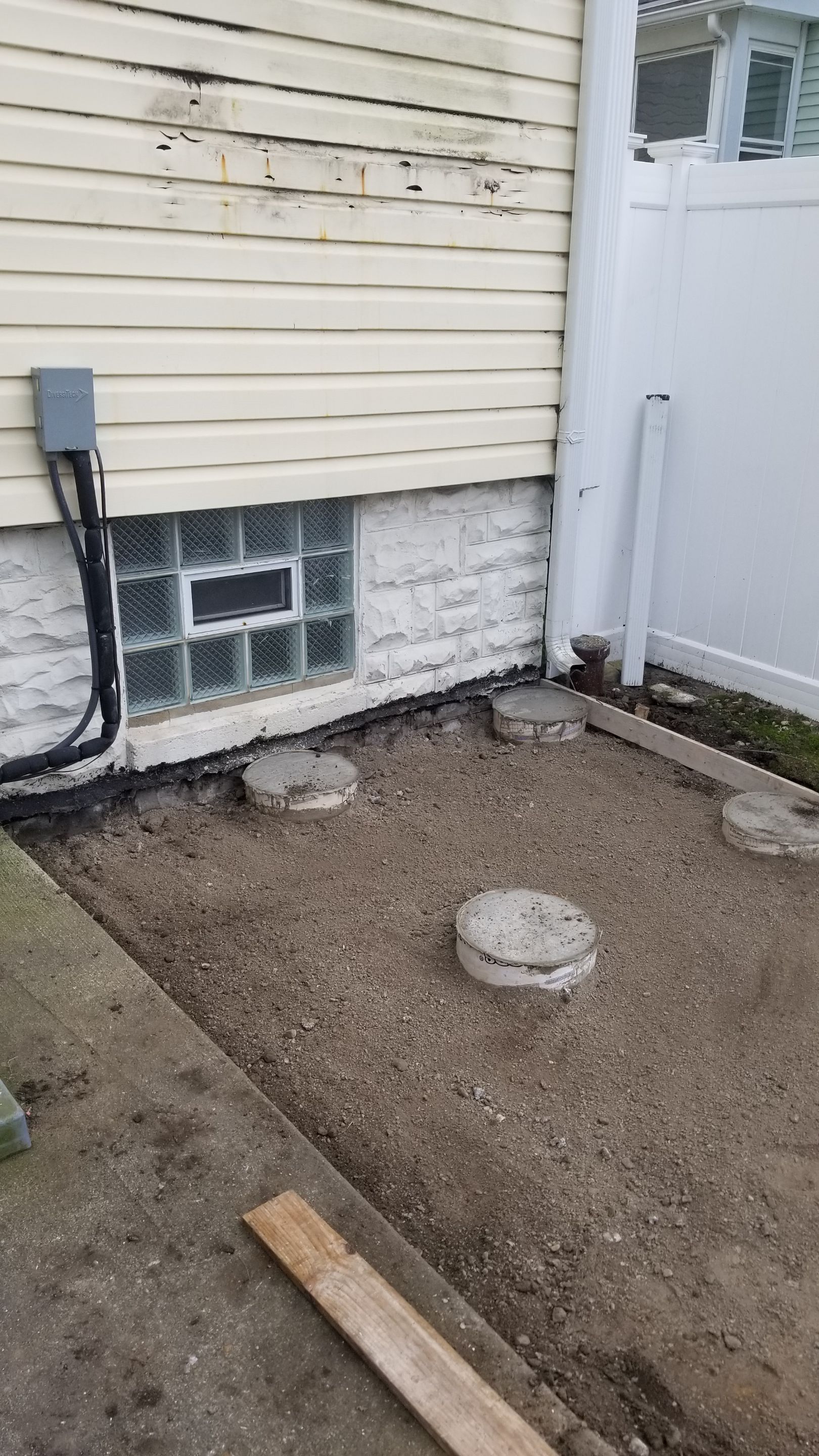 Rebuild balcony flat roofing TREX decking stairway and Railings in Wyandotte, MI by Northwest Construction 