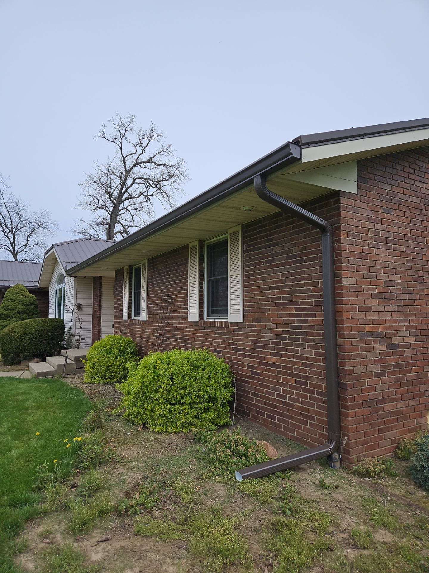 Residential Roofing Installation using Performance Panel Metal - Crinkle Bronze by RoofX 