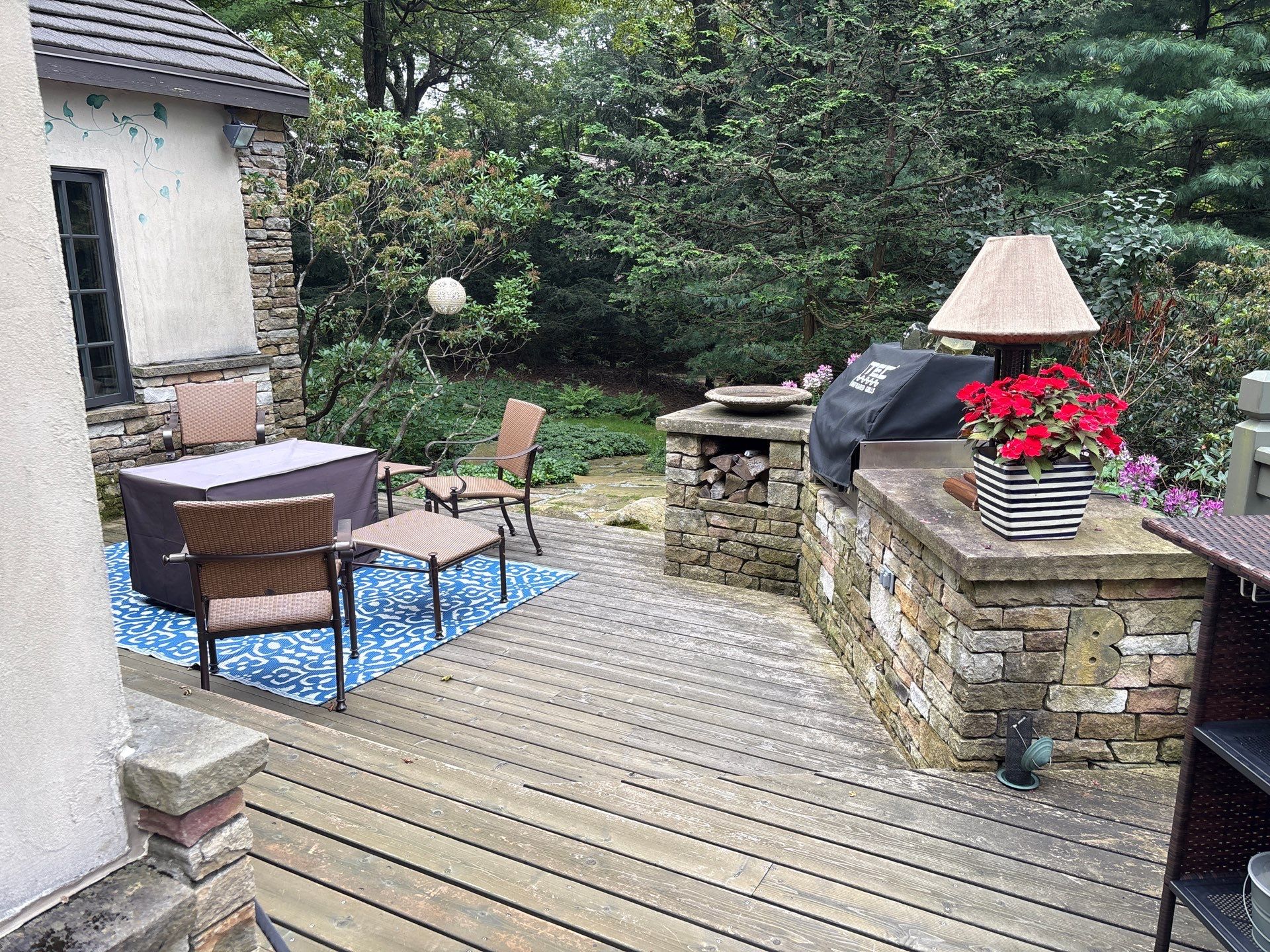 1500 sq/ft Composite Deck Build with Outdoor Kitchen in Champion by Cousins Roofing Siding & Decks