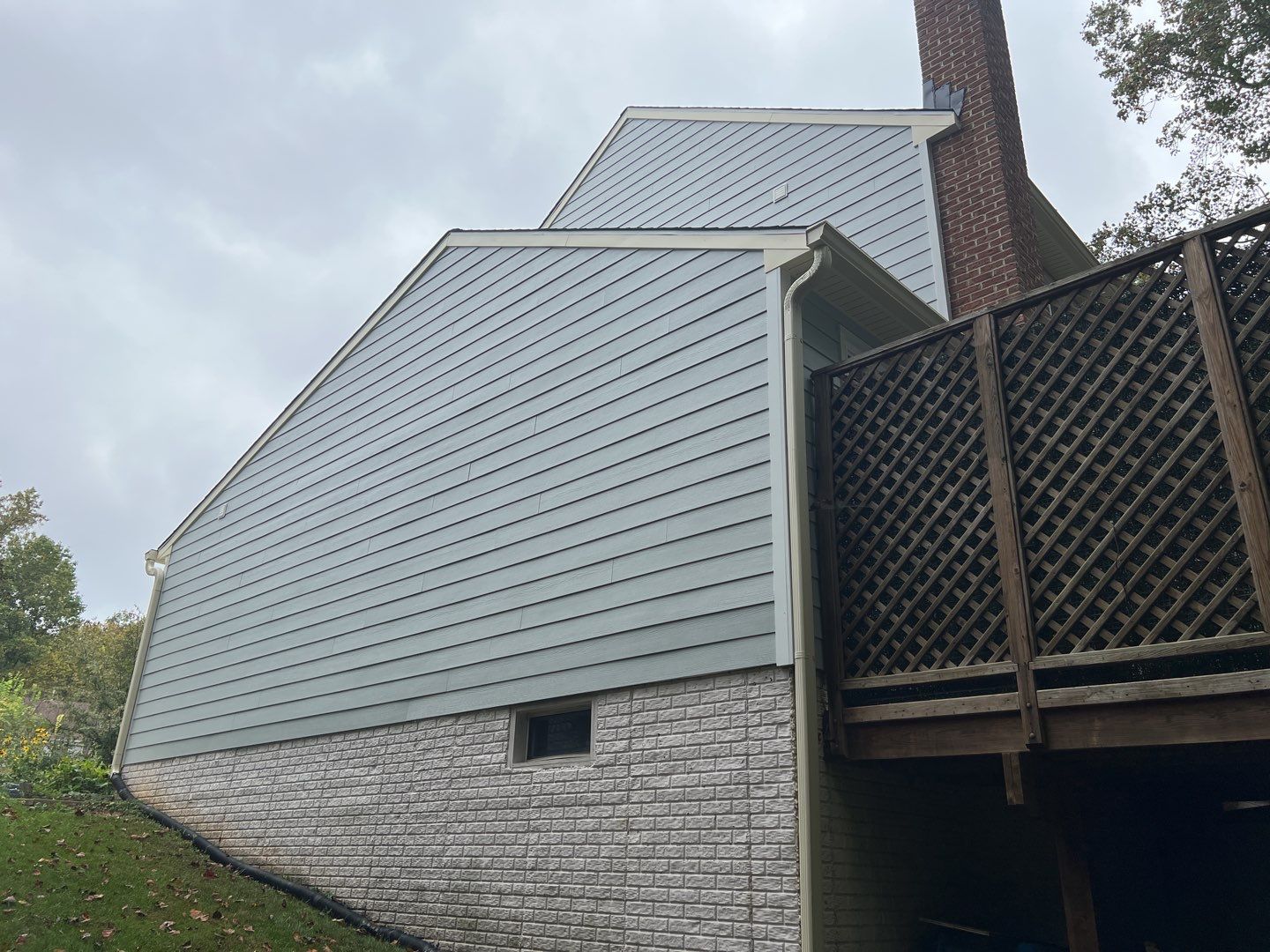 Exterior Home Makeover using GAF Timberline HDZ, GAF Decotech, and James Hardie Siding by American Home Contractors