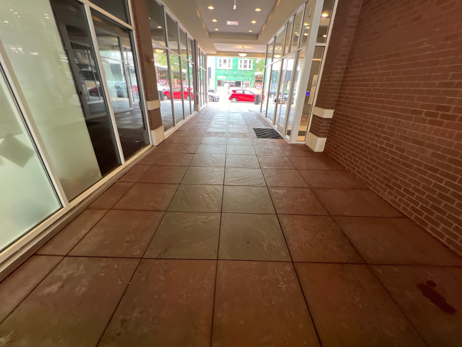 Parking garage using Hot water by Northern Power Washing LLC.