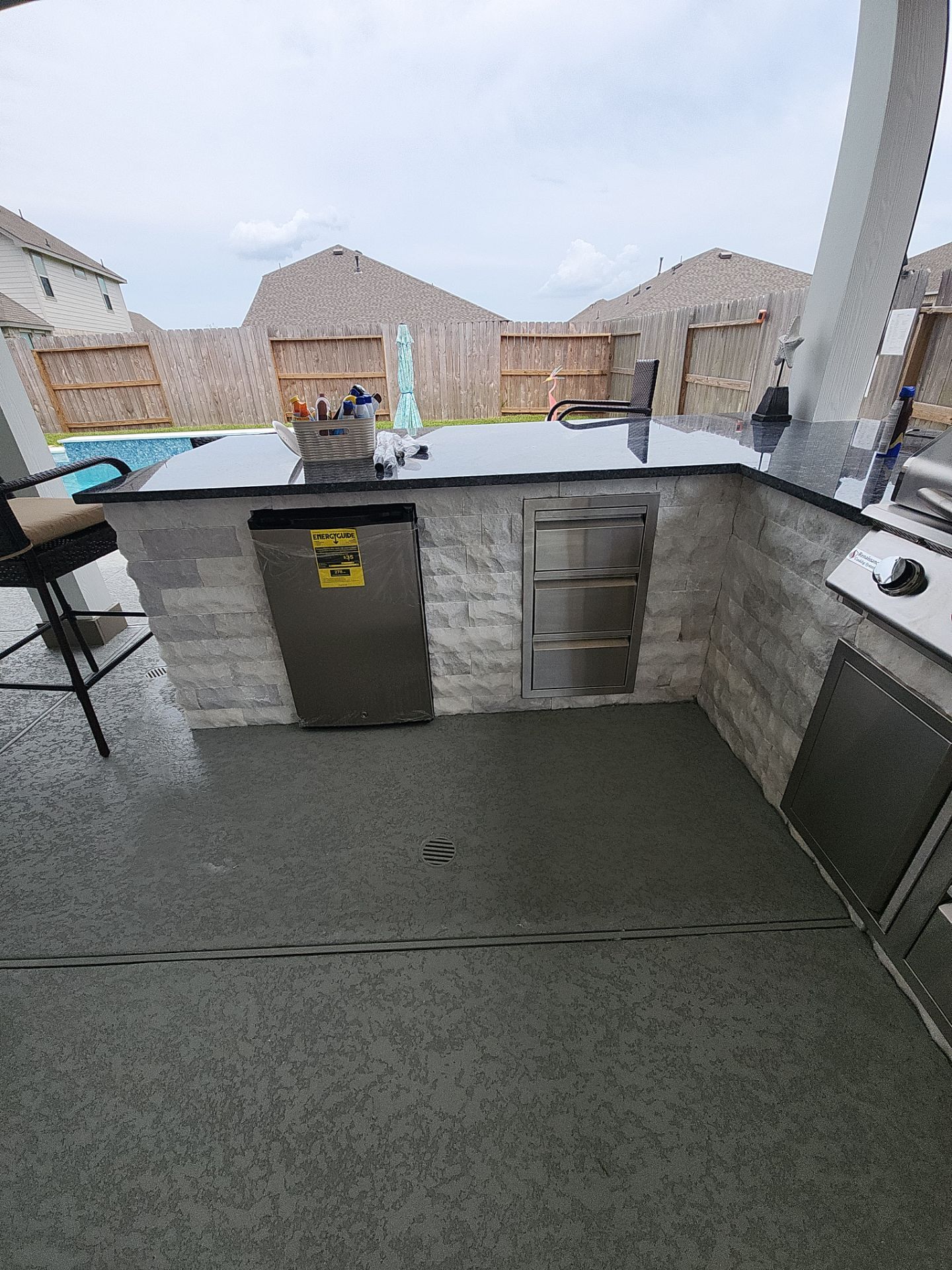 Patio and Summer Kitchen in Texas city by SophAlx LLC