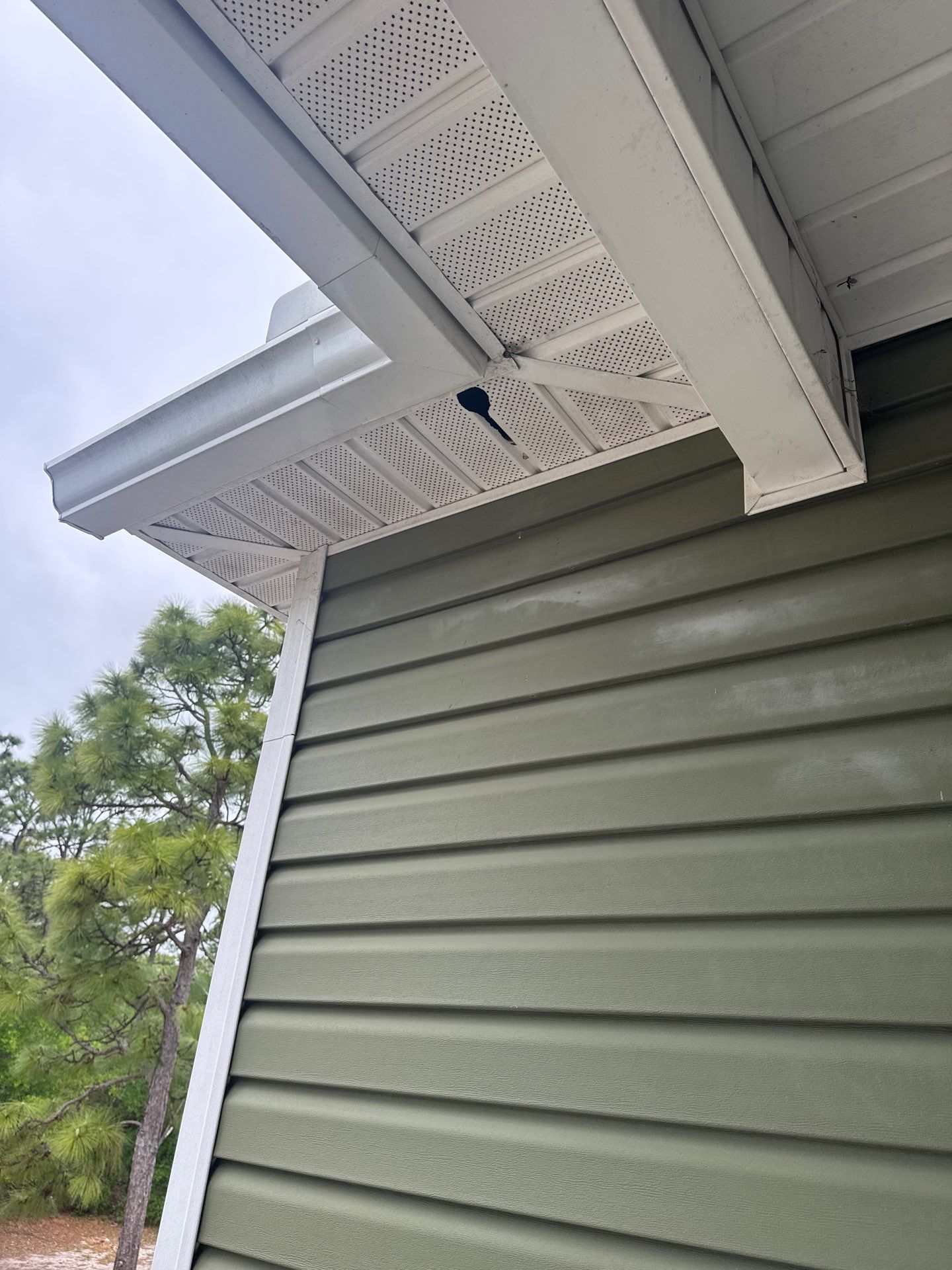 Vented Vinyl Soffit Repair in Oak Island, NC by RGR Construction and Roofing, LLC