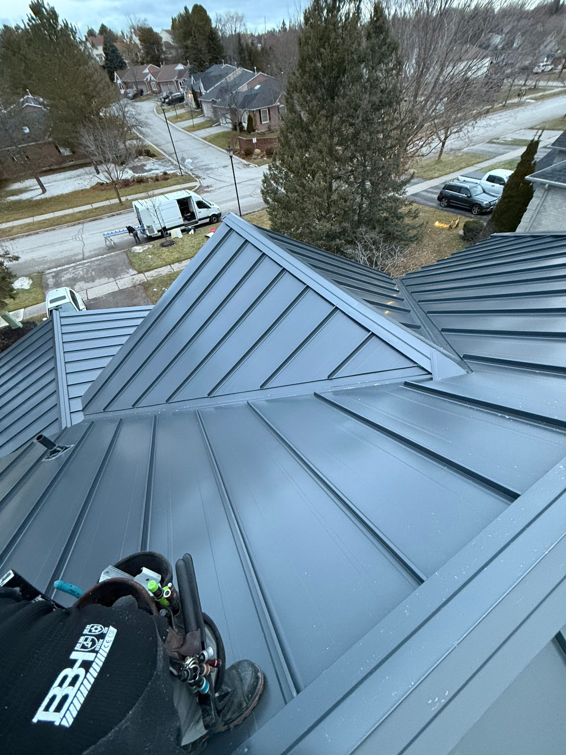 Roof Replacement using 16" Standing Seam Panels by Jay Carter Roofing & Sheet Metal