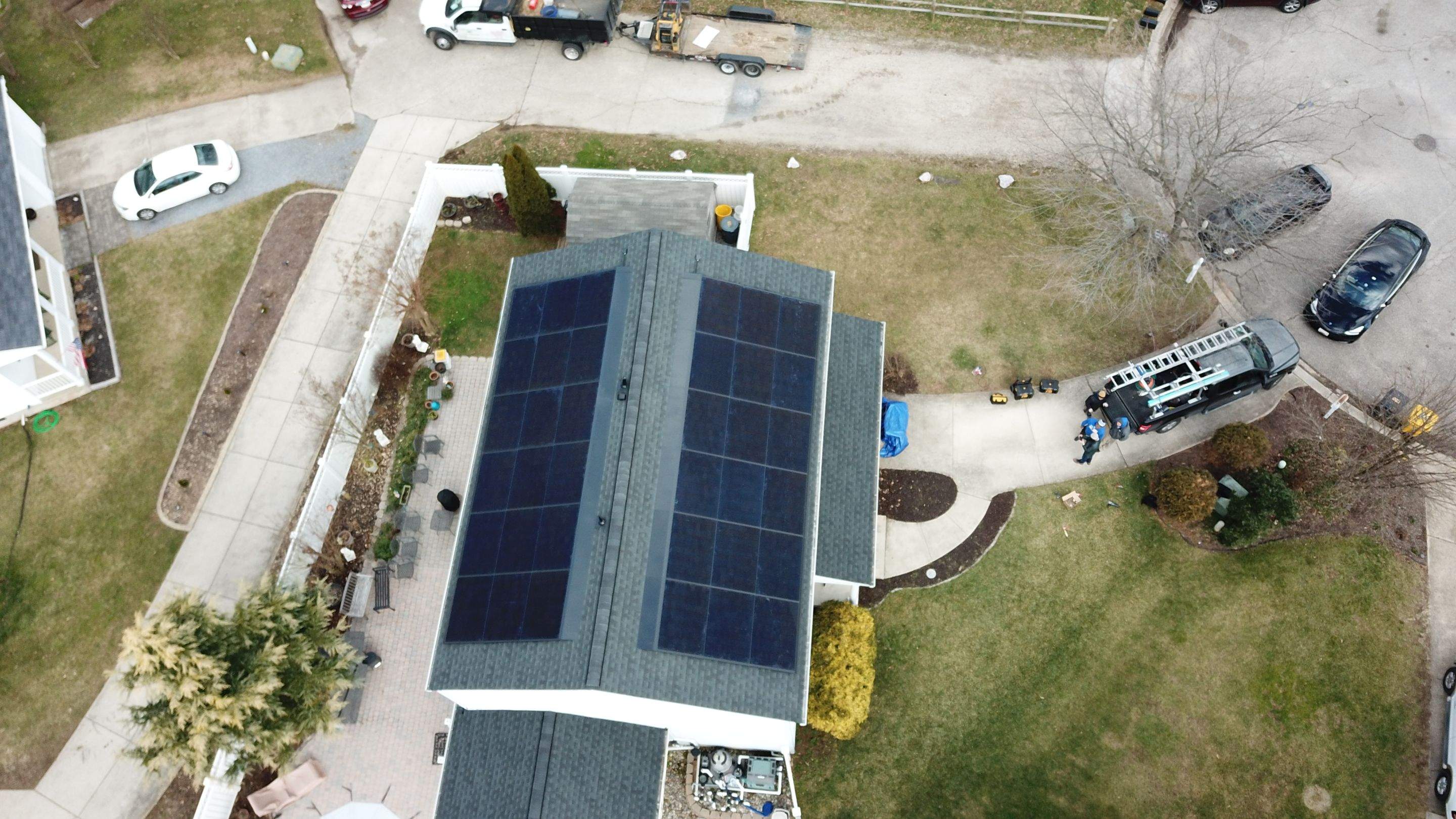 Roof Replacement with GAF Decotech integrated solar panels by American Home Contractors