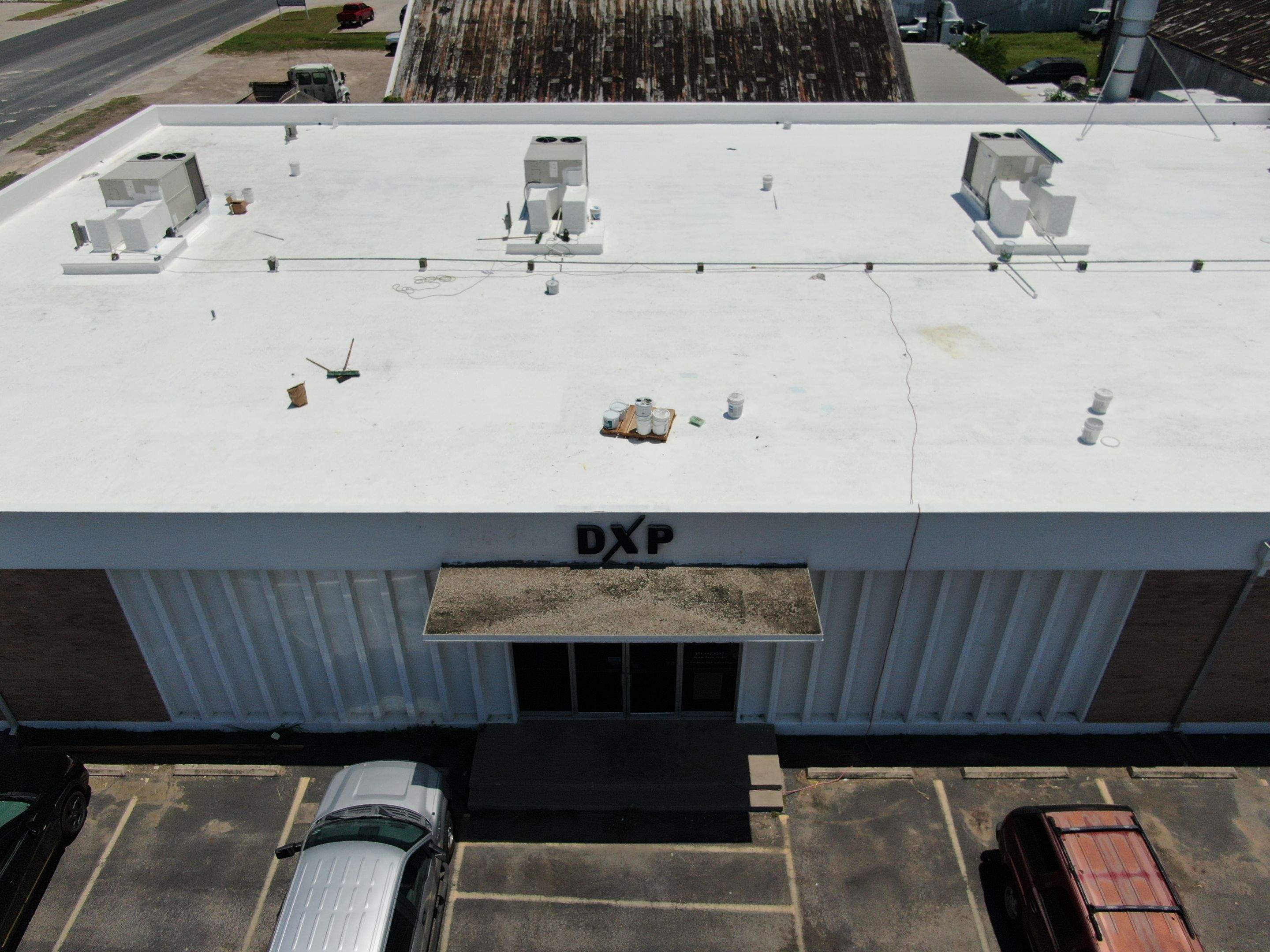 Dirty leaking Gravel Roof by Bayfront Roofing and Construction
