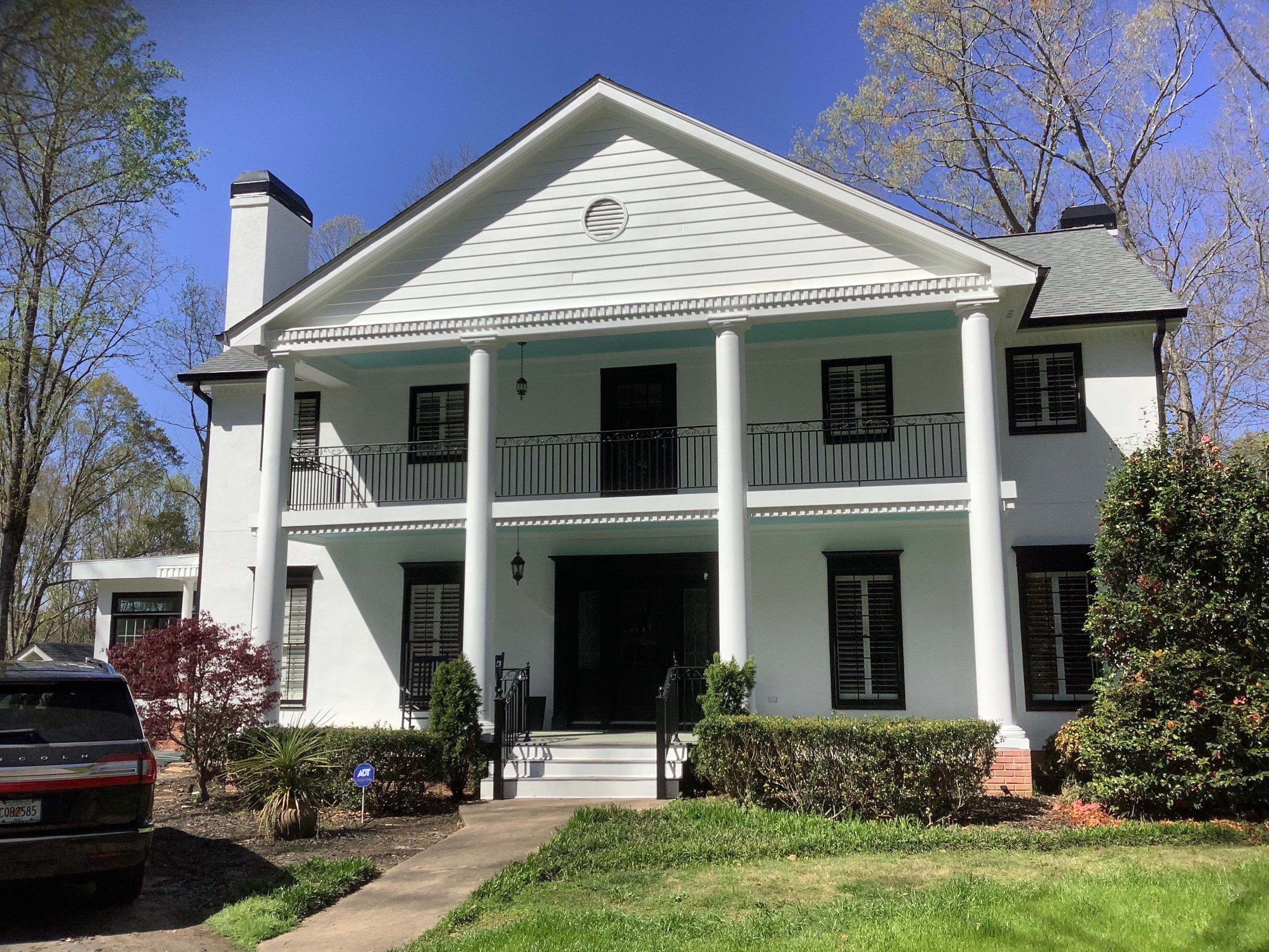 Full Exterior Repaint for Colonial Style Home in Cumming by Swift Home Renovations