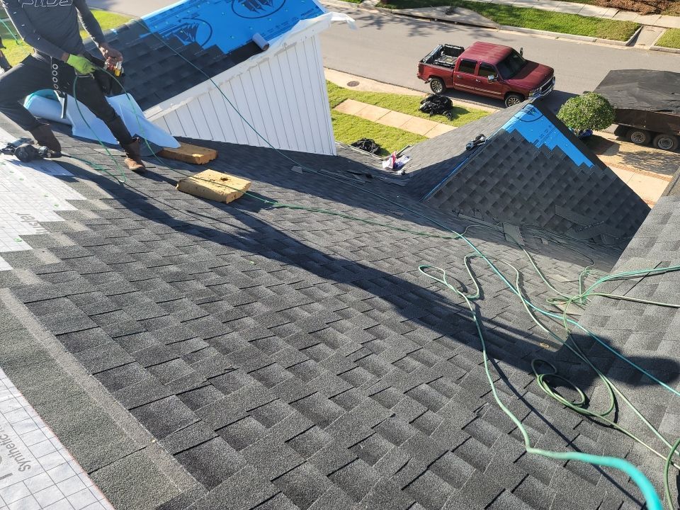 Residential Roofing Installation using Roof Replacement by American Roofing & Construction LLC