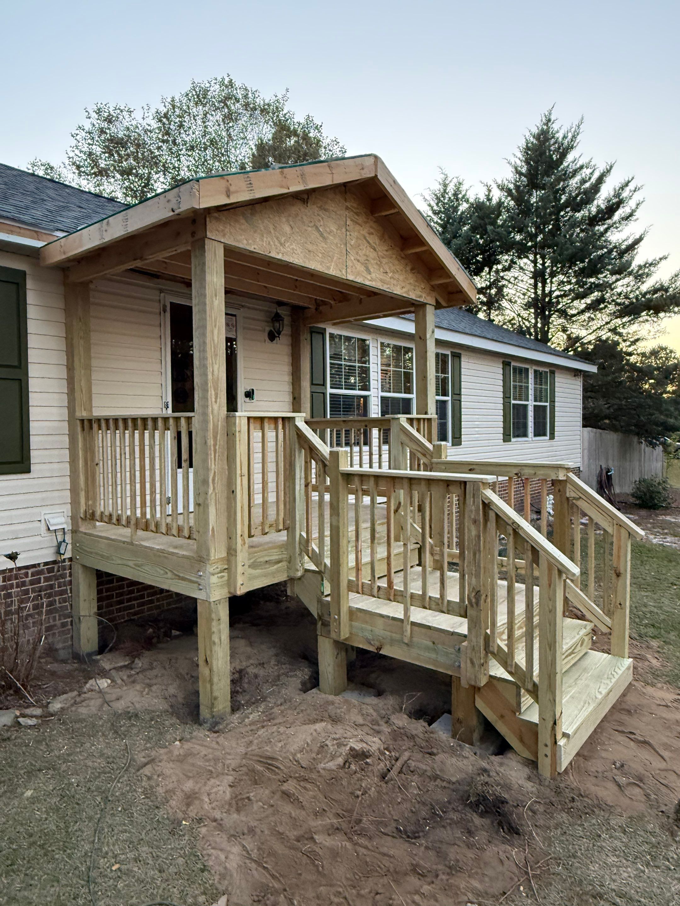 Full Roof Replacement and Custom Front Porch Addition in Pinebluff by The Remodeling Company