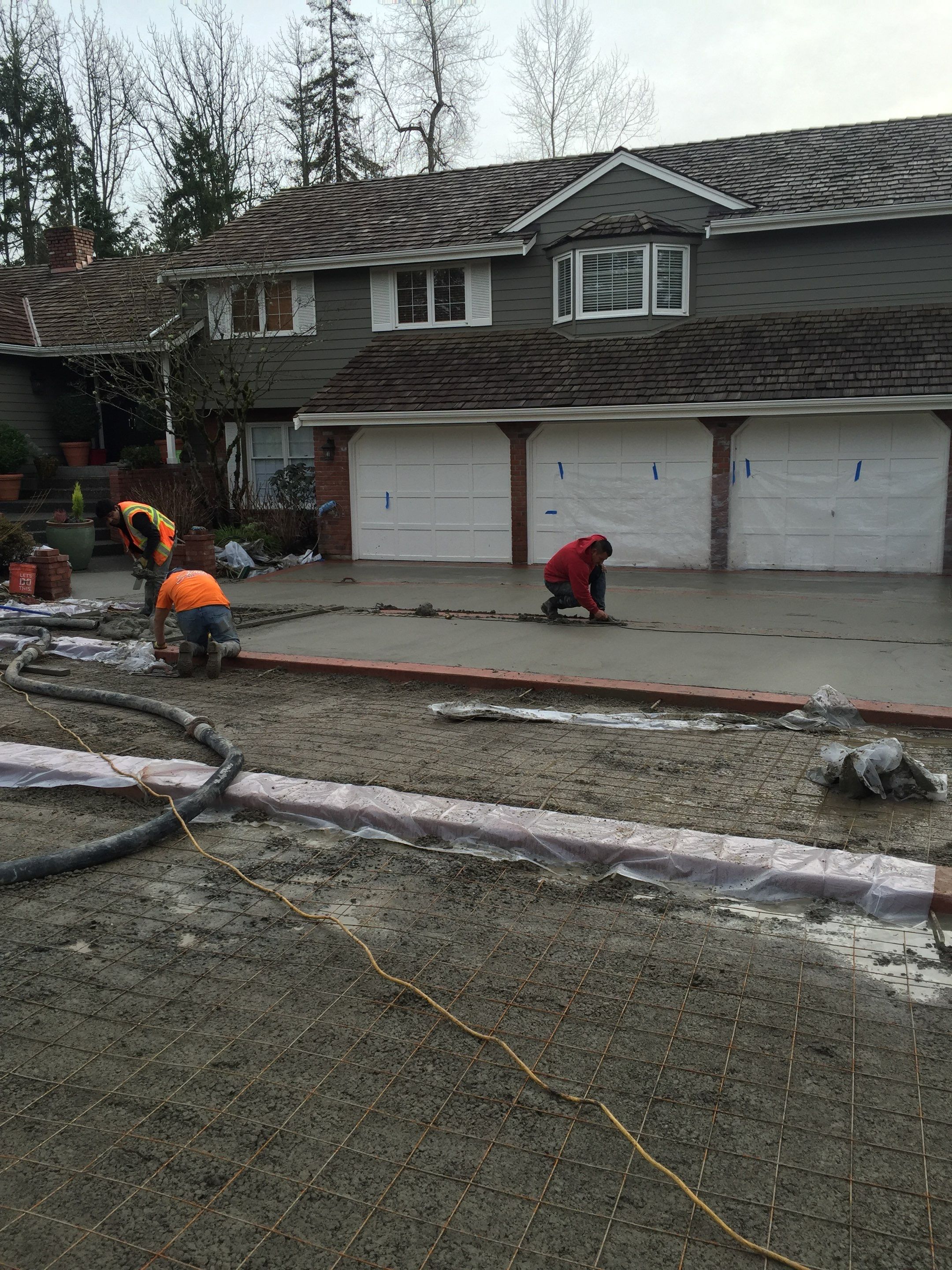 Custom Aggregate Driveway and Stamped Finish  by Jireh Asphalt & Concrete Inc 