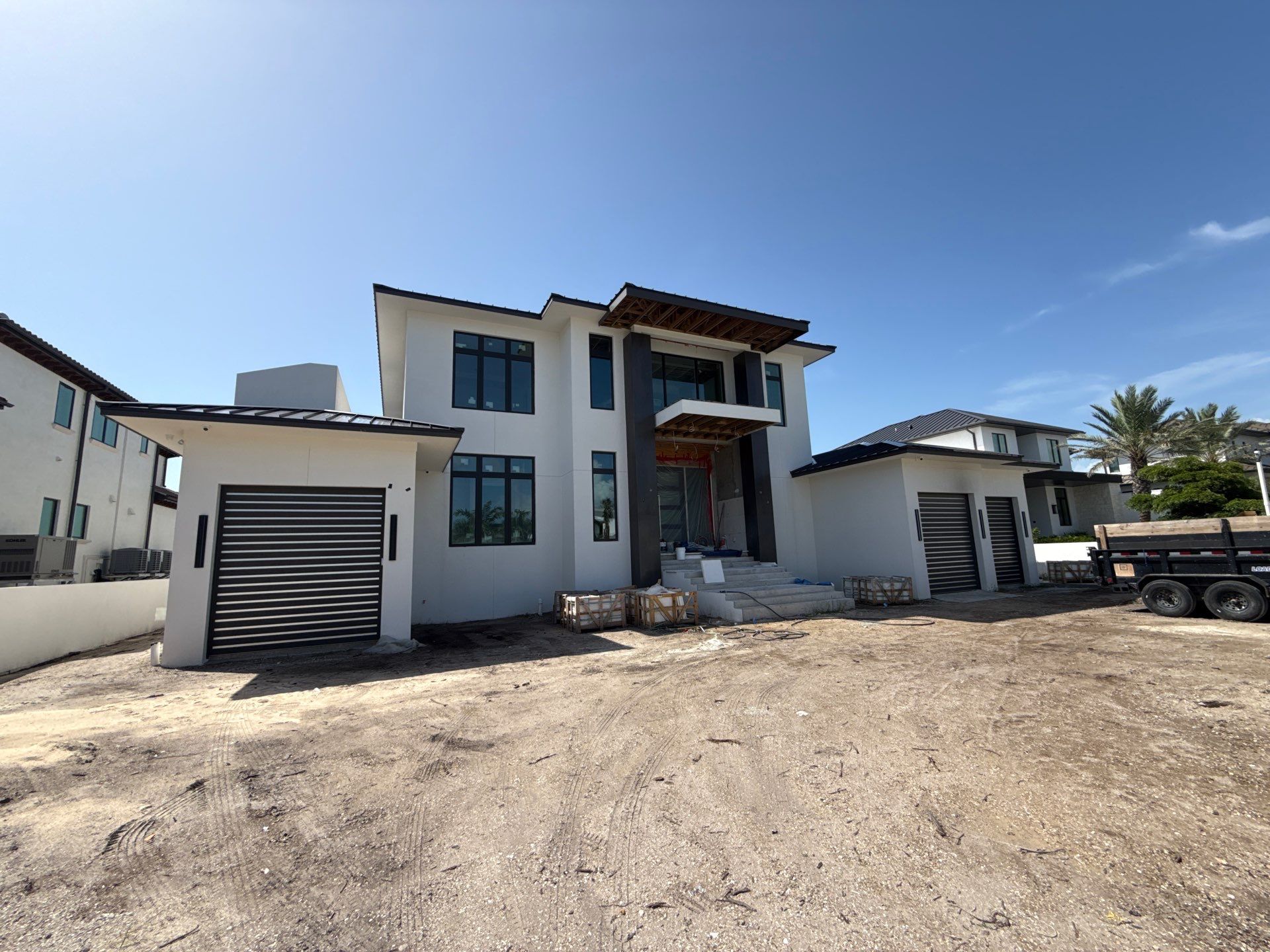 Seamless Aluminum Gutter Installation using black seamless gutters in Sarasota FL by Gutter Professors