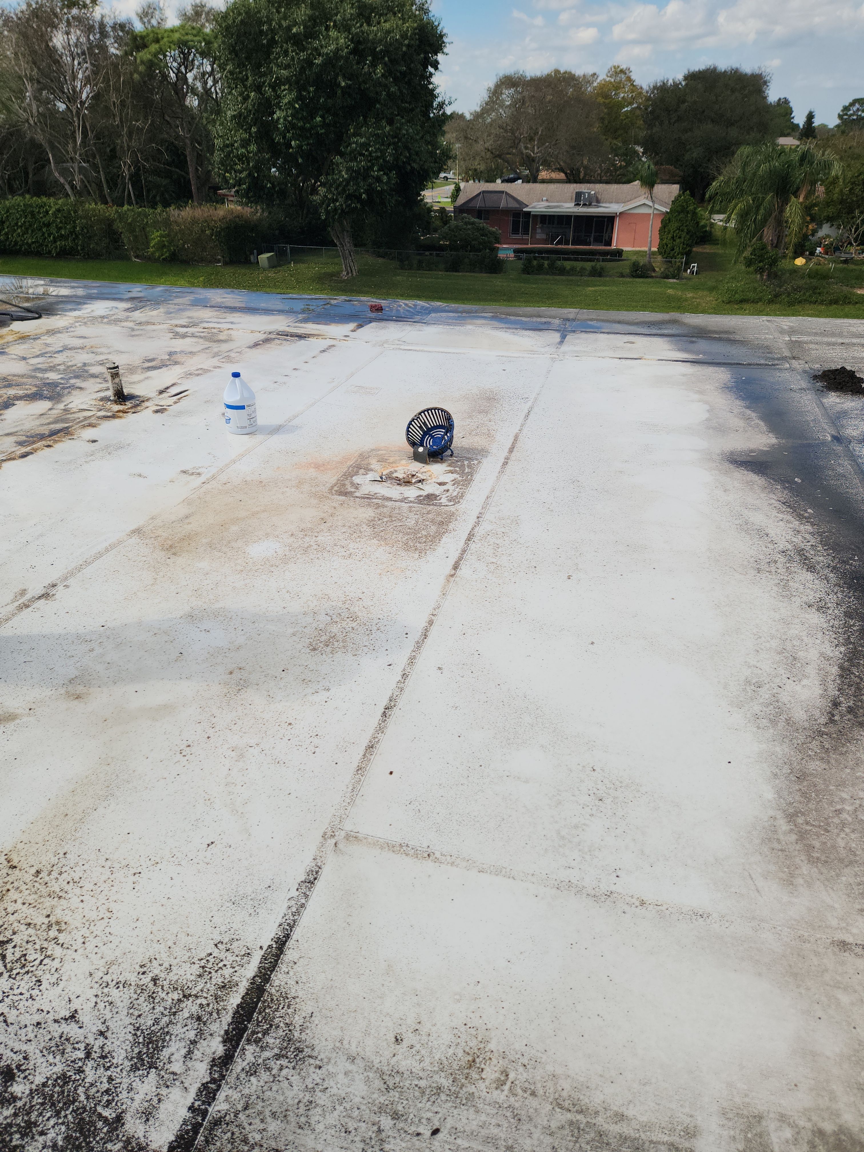Reflective Silicone Roof Coating and Maintenance in Palm Beach Gardens by Aastro Roofing
