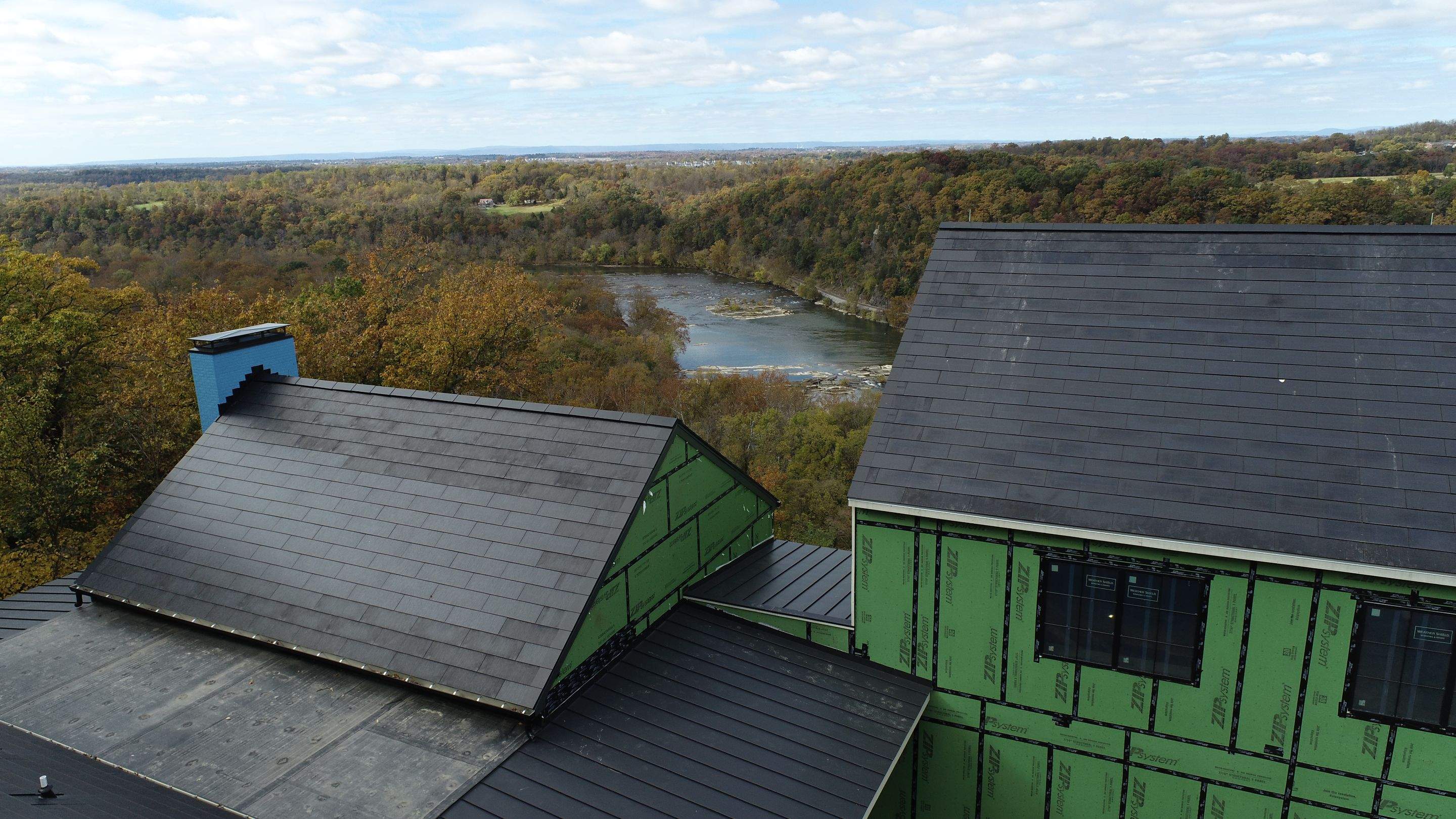 Roof Installation using Tesla Solar Roof V3 by American Home Contractors
