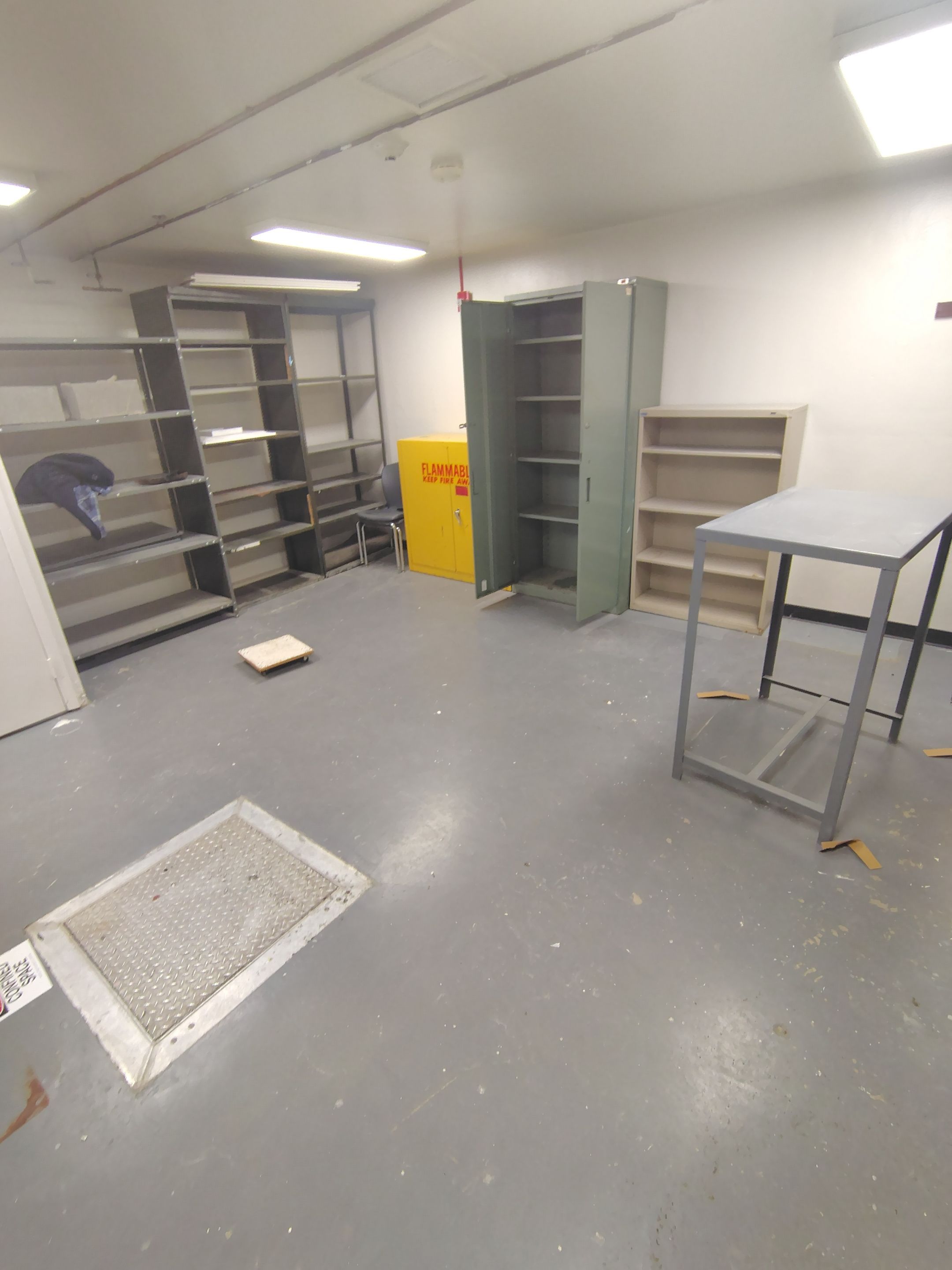 Industrial Flake Epoxy Floor Installation at Pierre National Guard Facility by Select Painting, Coatings & Garage Cabinets