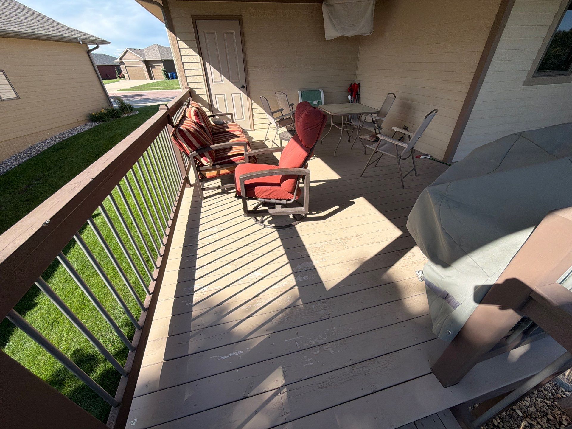 Sioux Falls Exterior Refresh and Multi-Level Deck Maintenance by Select Painting, Coatings & Garage Cabinets