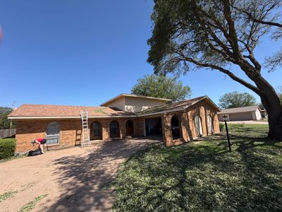 Full Roof Replacement and Privacy Fence Installation in Burkburnett