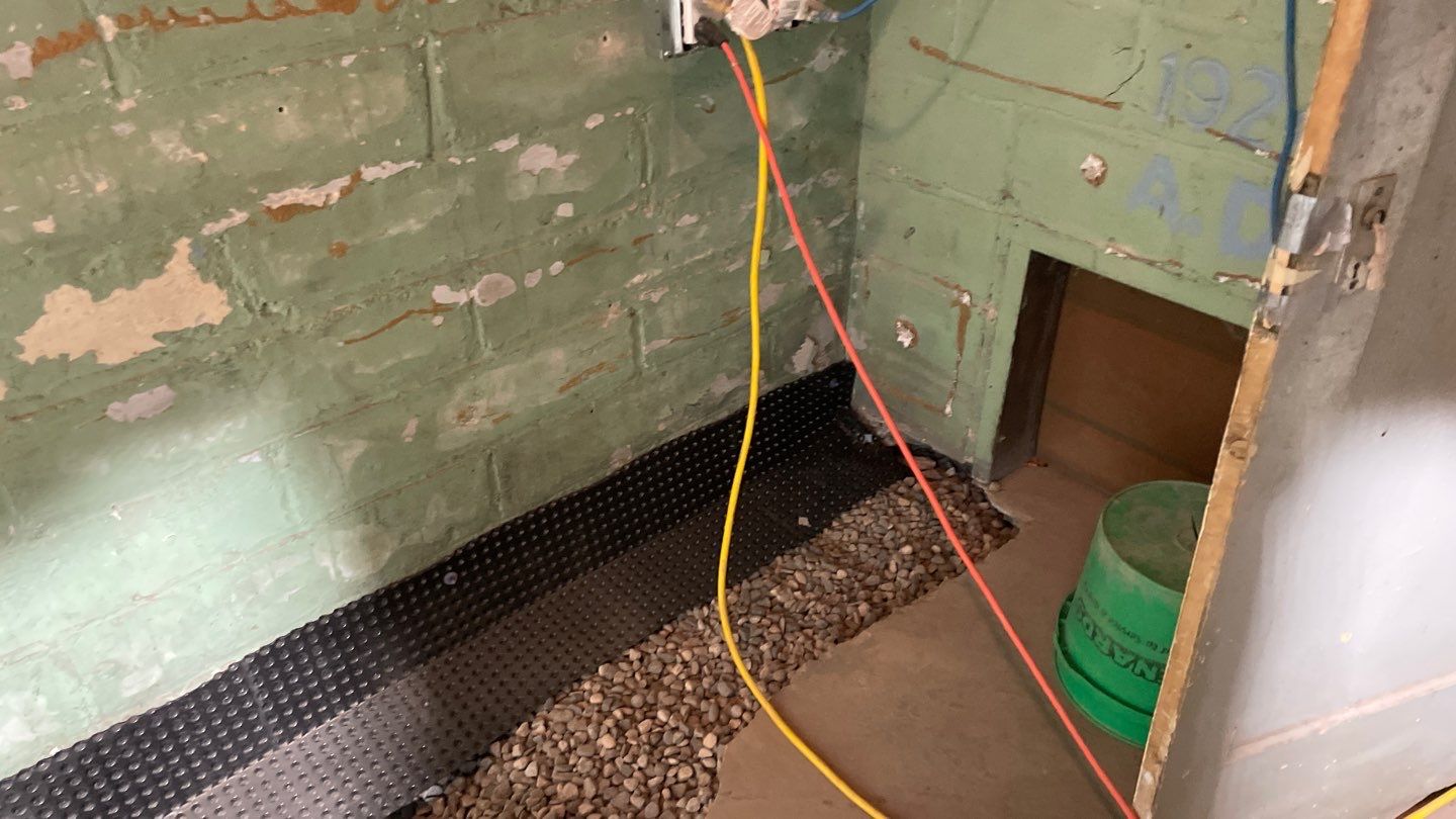 Interior Drain Tile for a South Minneapolis Basement by Waterproofing Northeast