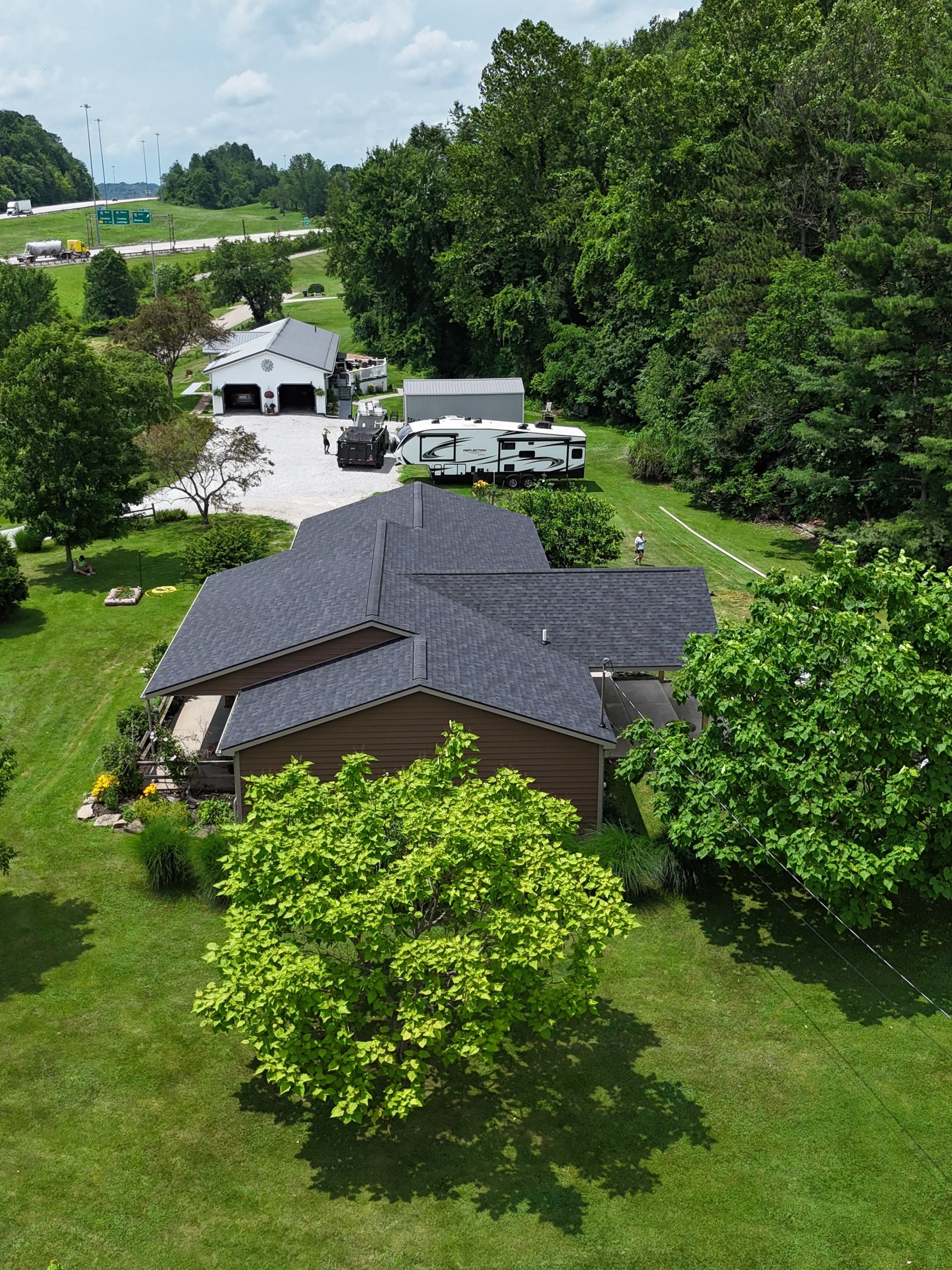 Cambridge Ohio Shingle Roof and Patio Roof Installation by Pine Ridge Roofing LLC